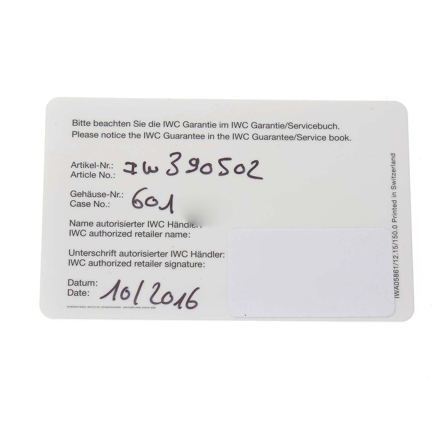 This is an IWC Portuguese IW390502 Men's Stainless Steel Silver Dial model warranty card, showing article and case numbers with blank retailer fields.
