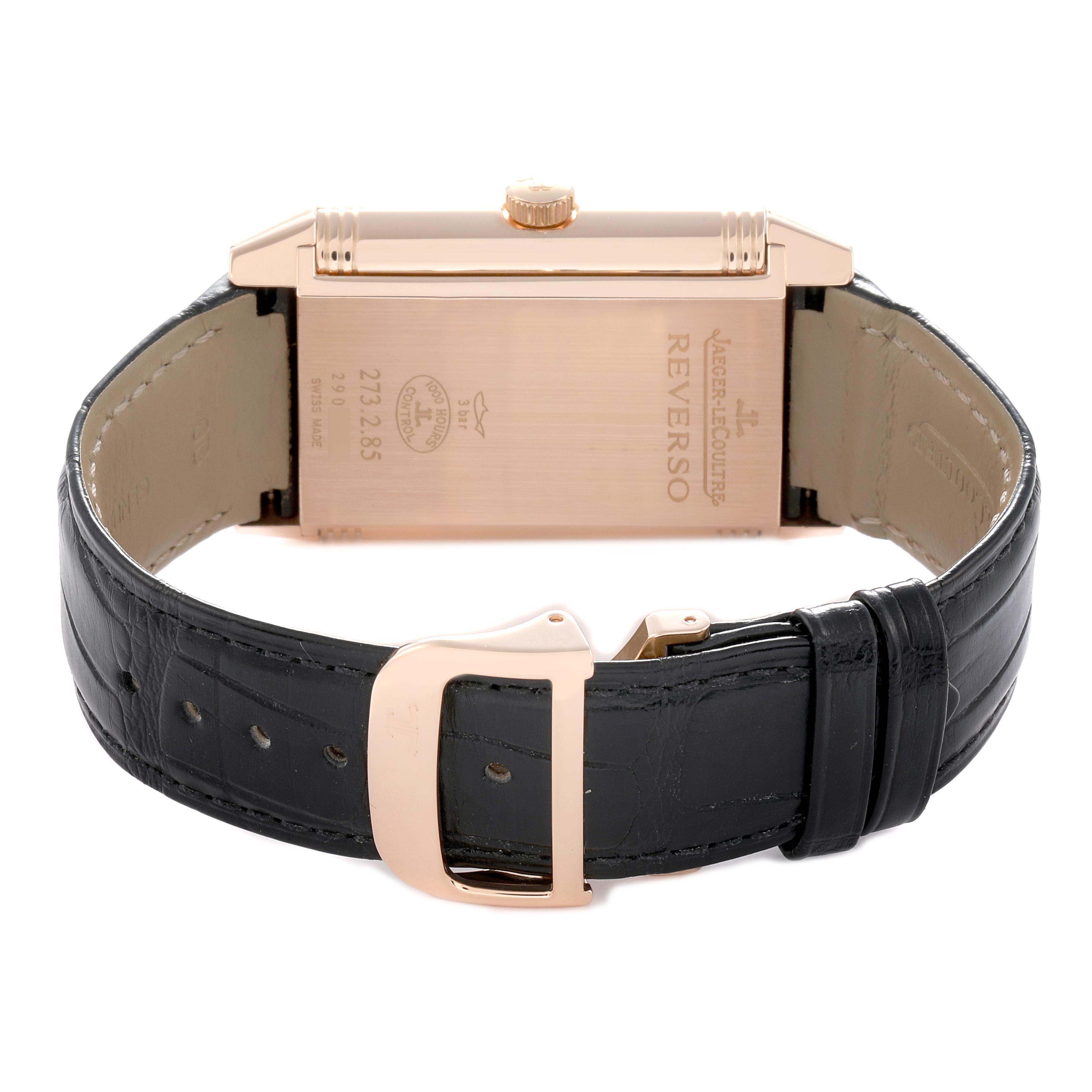 The image shows a Jaeger LeCoultre Reverso Q3742421 Men's Rose Gold Silver Dial watch from the side, highlighting the back case and black leather strap.