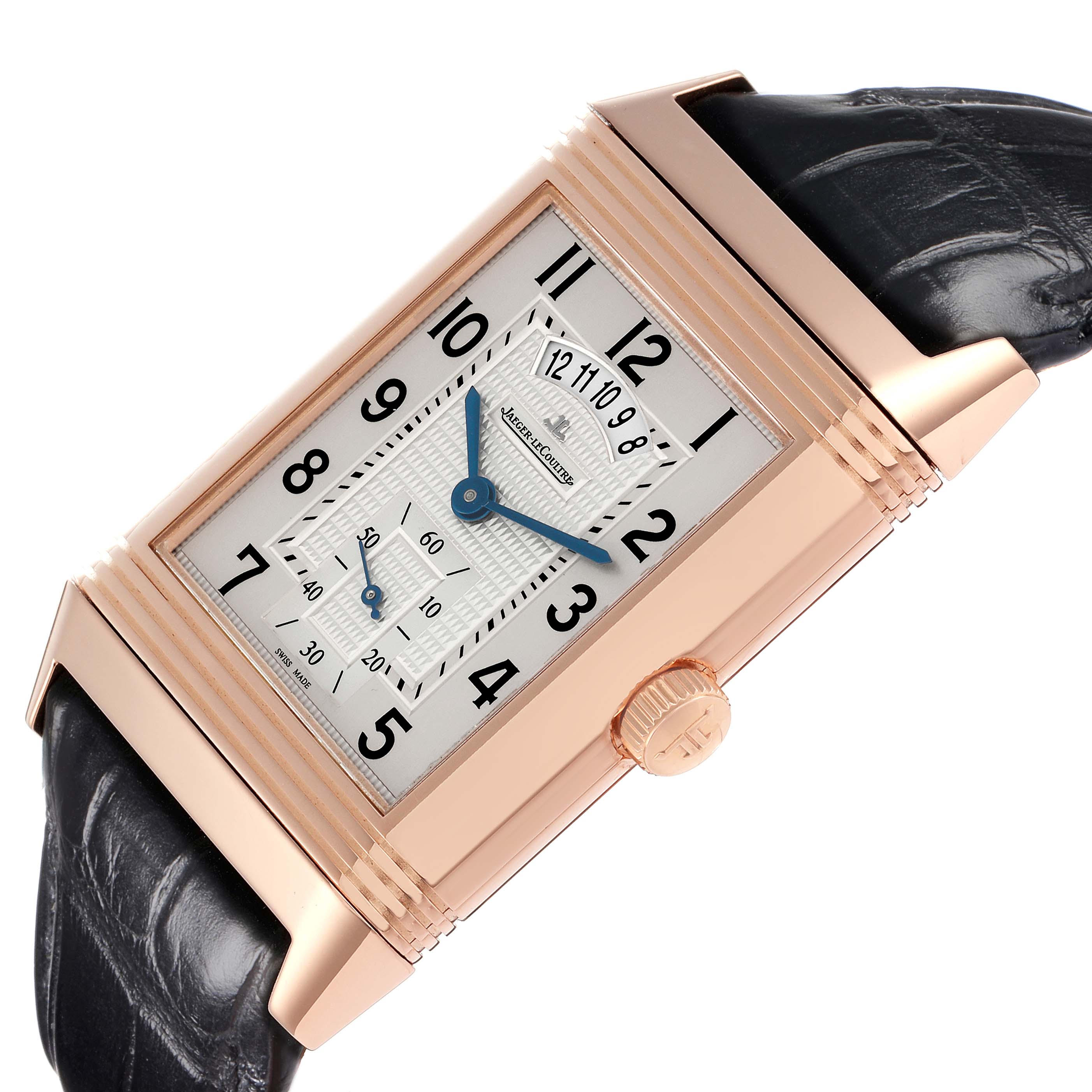The Jaeger-LeCoultre Reverso watch is shown at an angle highlighting the watch face, case, crown, and a portion of its strap.