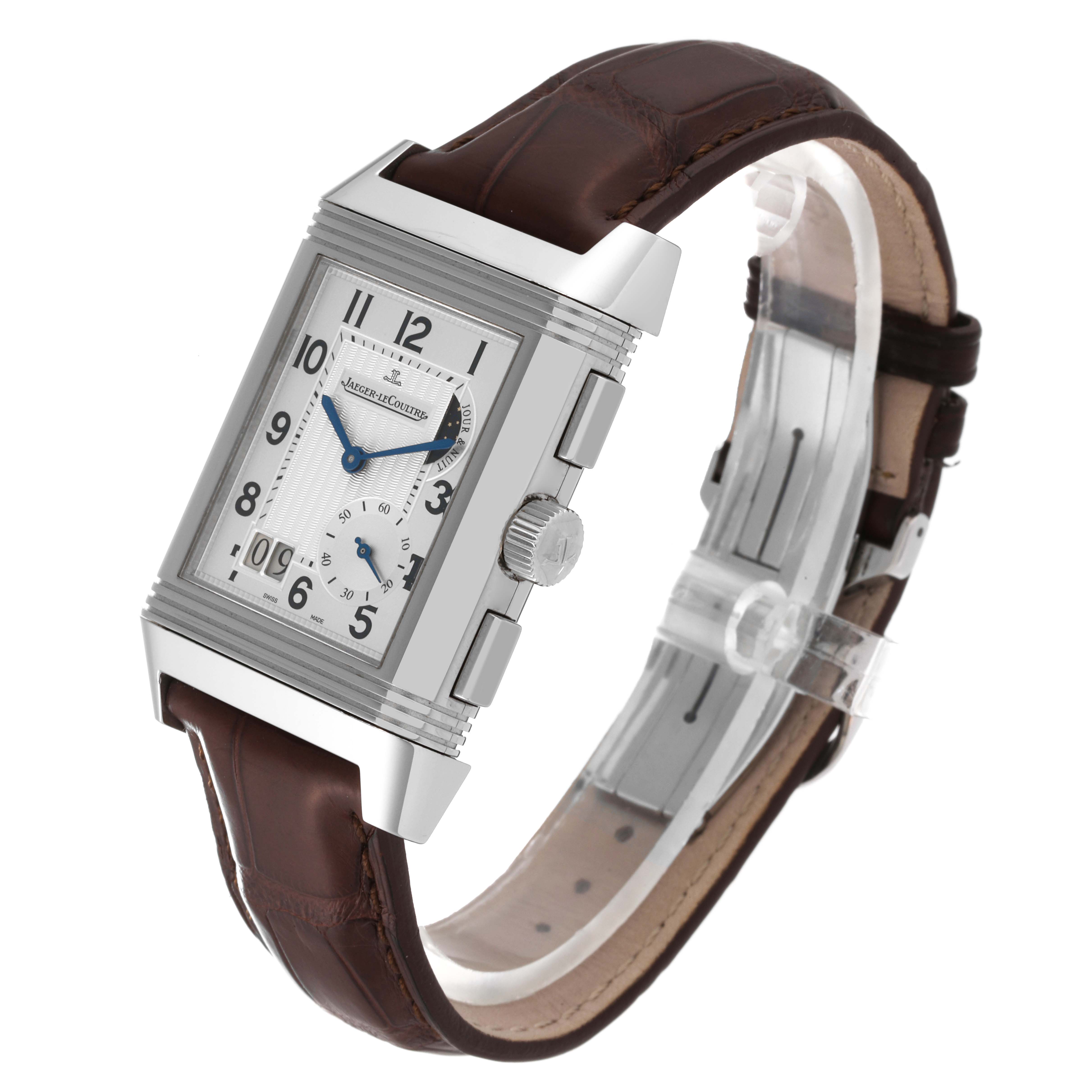 The image shows a Jaeger-LeCoultre Reverso watch with a rectangular face and a brown leather strap, viewed at an angle from the side.