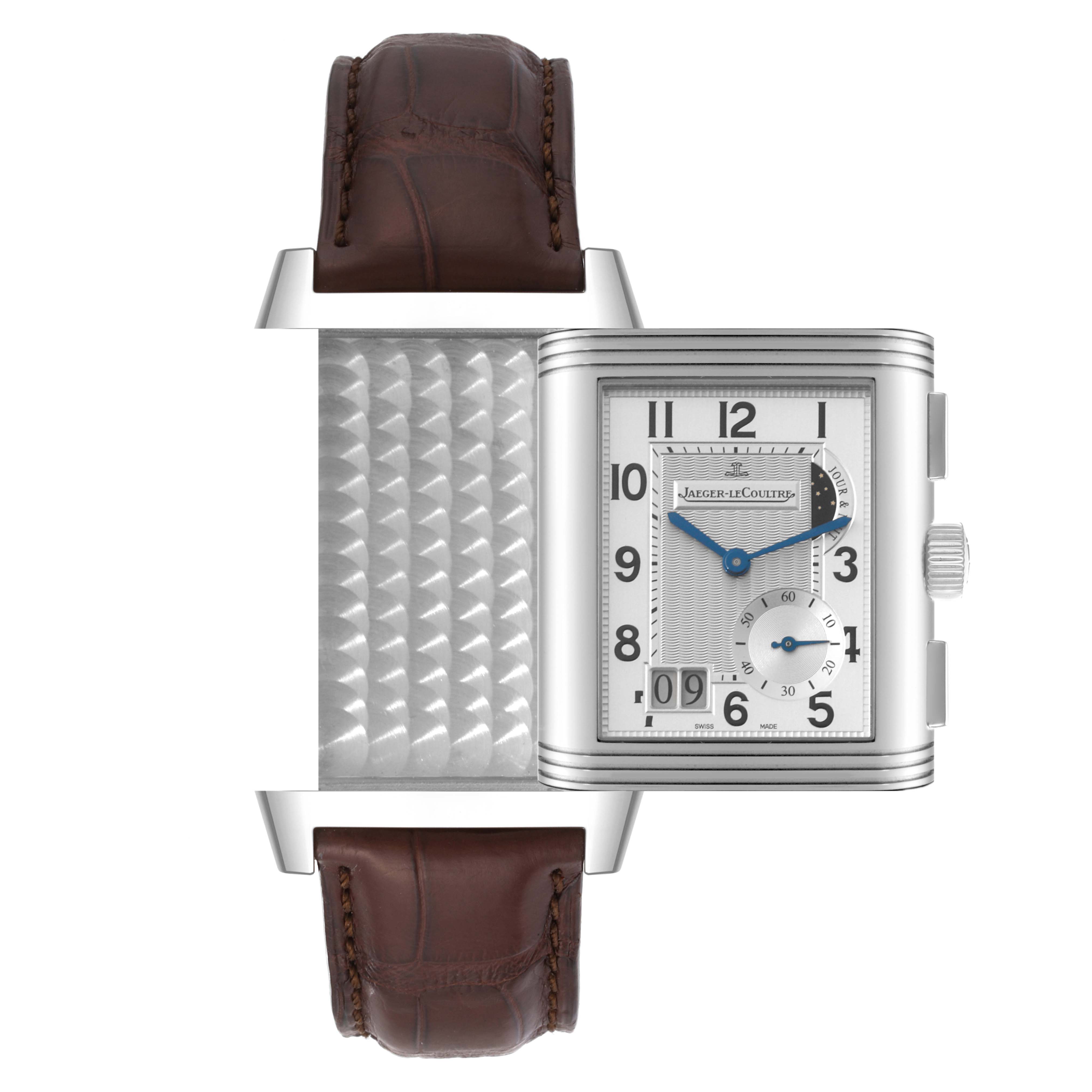The Jaeger LeCoultre Reverso Q3028420 Men's Stainless Steel Silver Dial Q3028420 Men's Stainless Steel Silver Dial watch is shown at a front angle, highlighting its reversible case, brown leather strap, and dial.