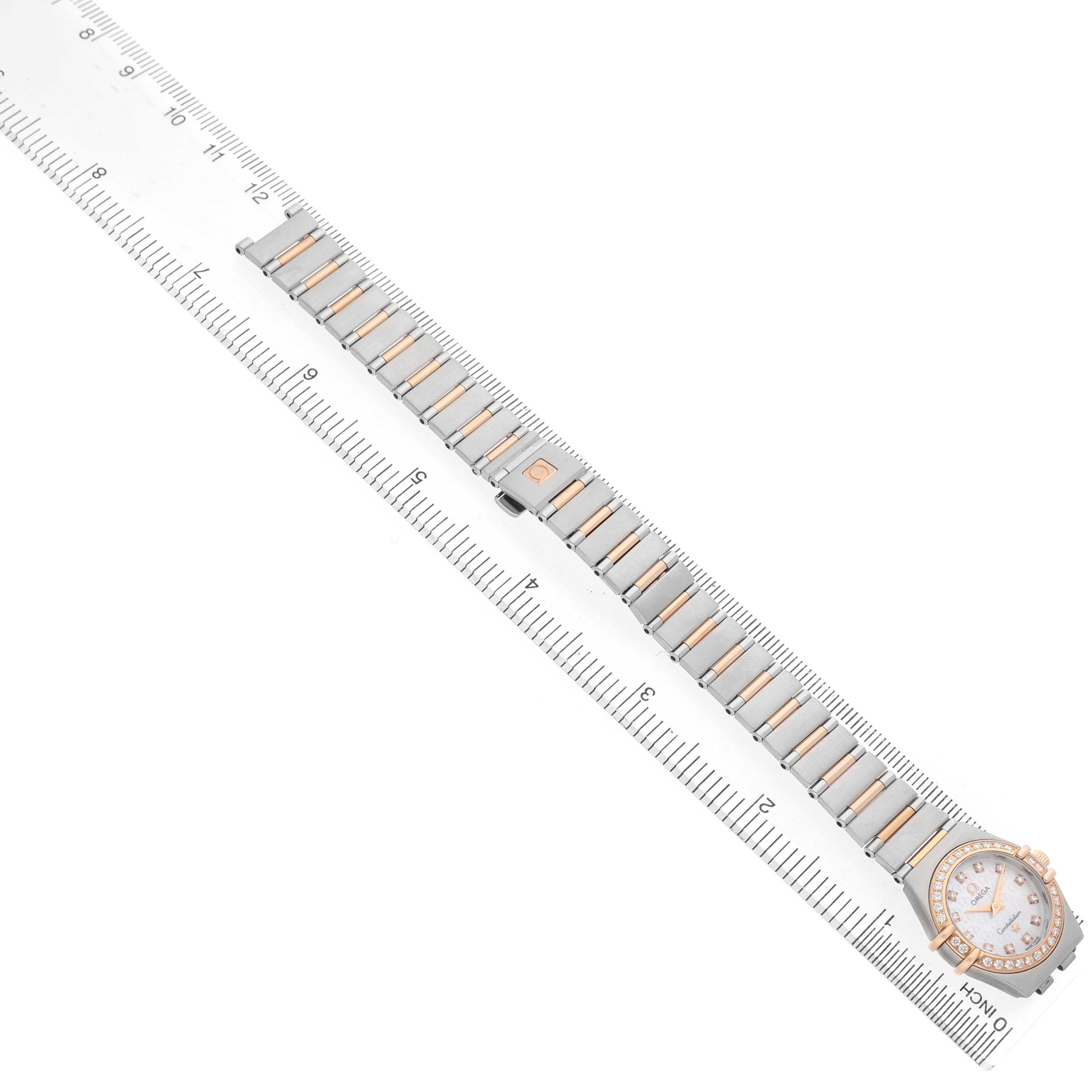 The Omega 1360.75.00 Women's Steel and Gold (two tone) Mother of Pearl Dial Constellation My Choice 1360.75.00 watch is shown from above, displaying its bracelet and dial with a measuring scale.