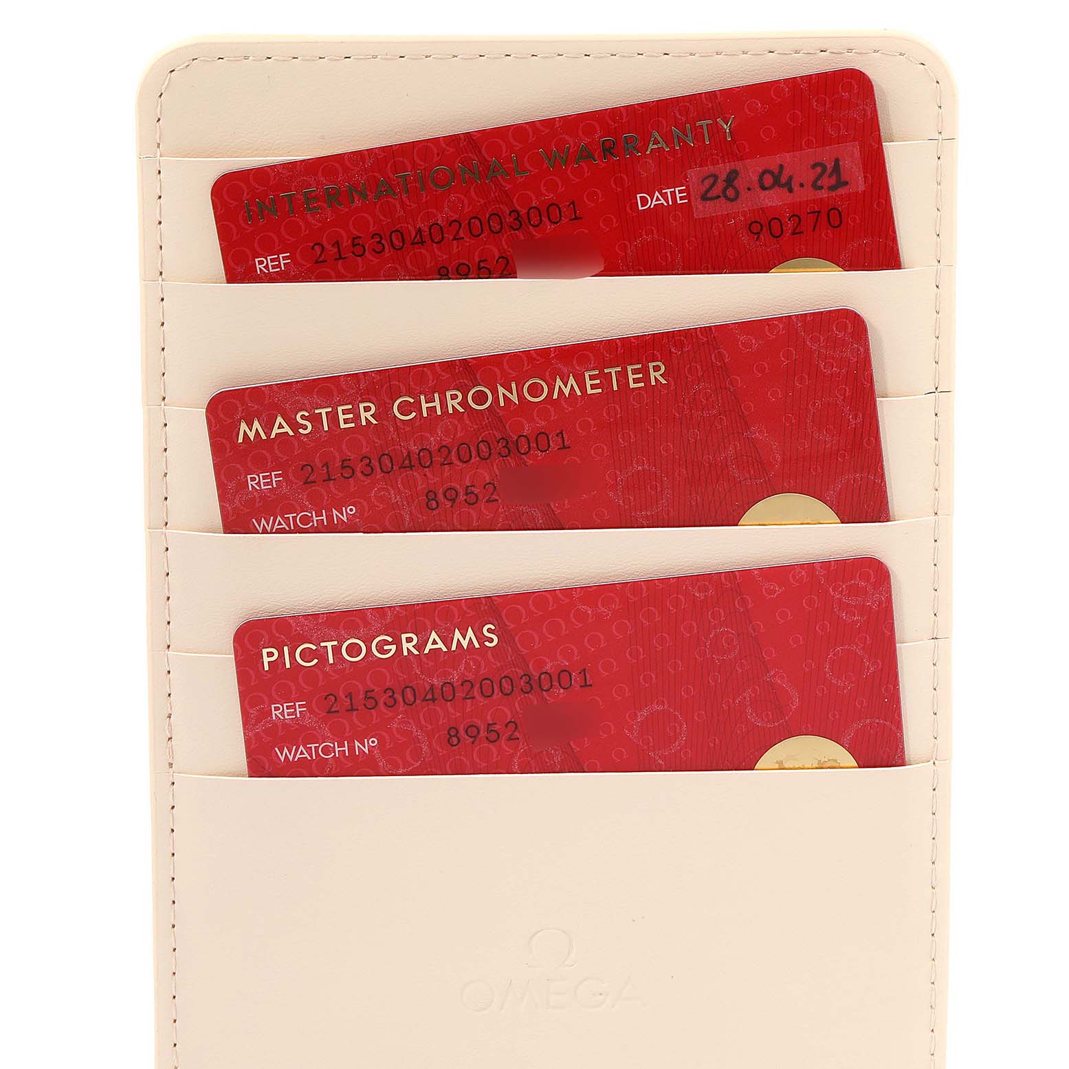 The image shows warranty, master chronometer, and pictograms cards in a leather holder for the Omega Planet Ocean 215.30.40.20.03.001 Men's Stainless Steel Blue Dial 215.30.40.20.03.001 Men's Stainless Steel Blue Dial model watch.