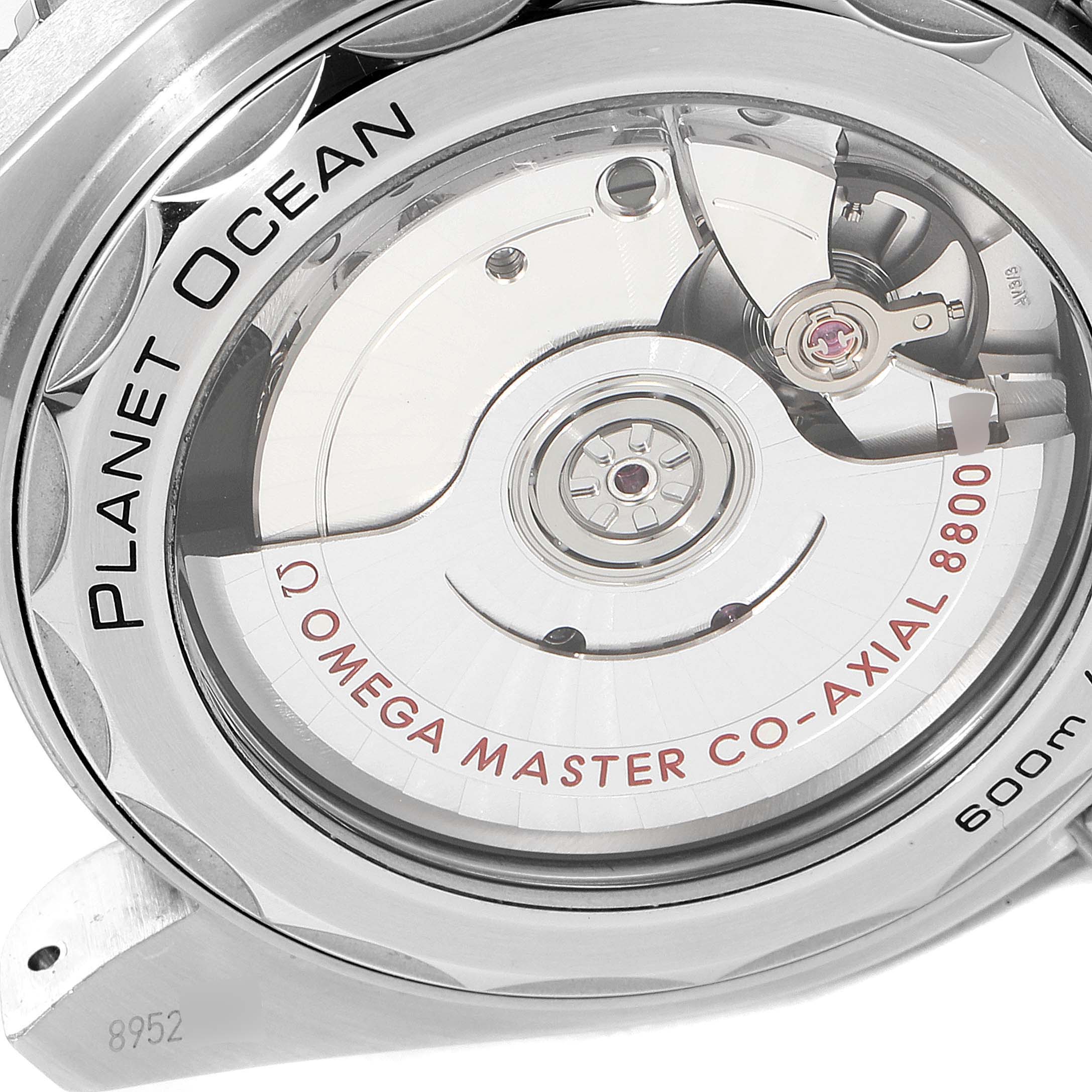 This image shows the case back of the Omega Planet Ocean 215.30.40.20.03.001 Men's Stainless Steel Blue Dial 215.30.40.20.03.001 Men's Stainless Steel Blue Dial watch, highlighting the Omega Master Co-Axial 8800 movement.