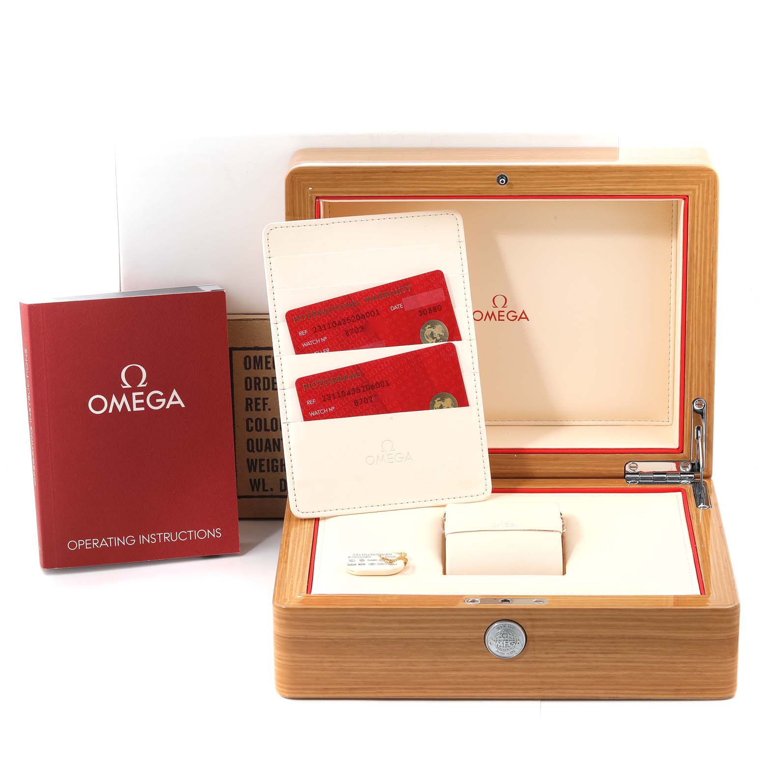 The image shows an Omega Aqua Terra 231.10.43.52.06.001 Men's Stainless Steel Grey Dial watch box with open packaging, red operating instructions, and warranty cards.