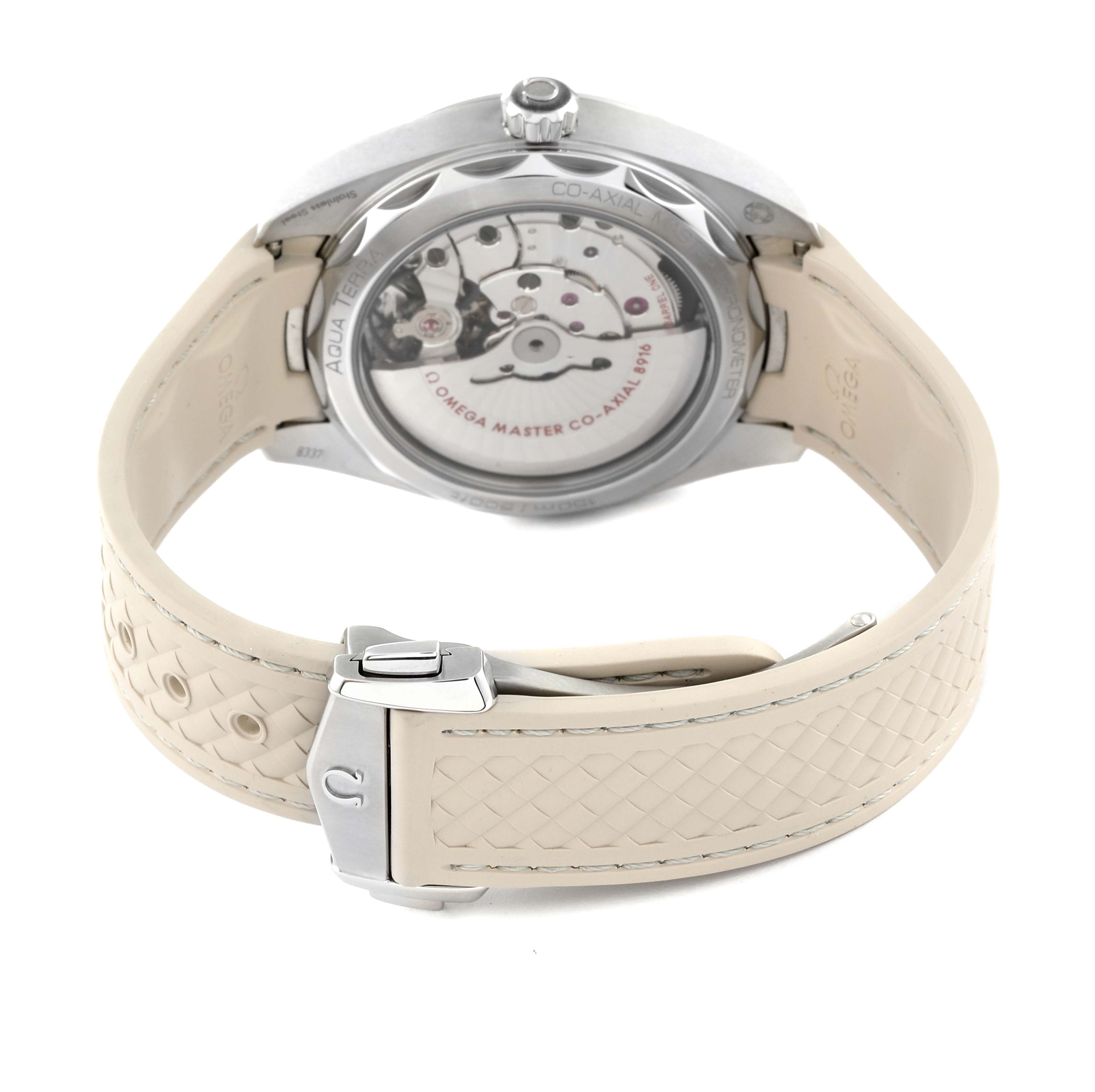 This image shows the back view of an Omega Aqua Terra 220.12.41.21.02.005 Men's Stainless Steel Silver Dial 220.12.41.21.02.005 Men's Stainless Steel Silver Dial watch, highlighting the movement and beige strap.