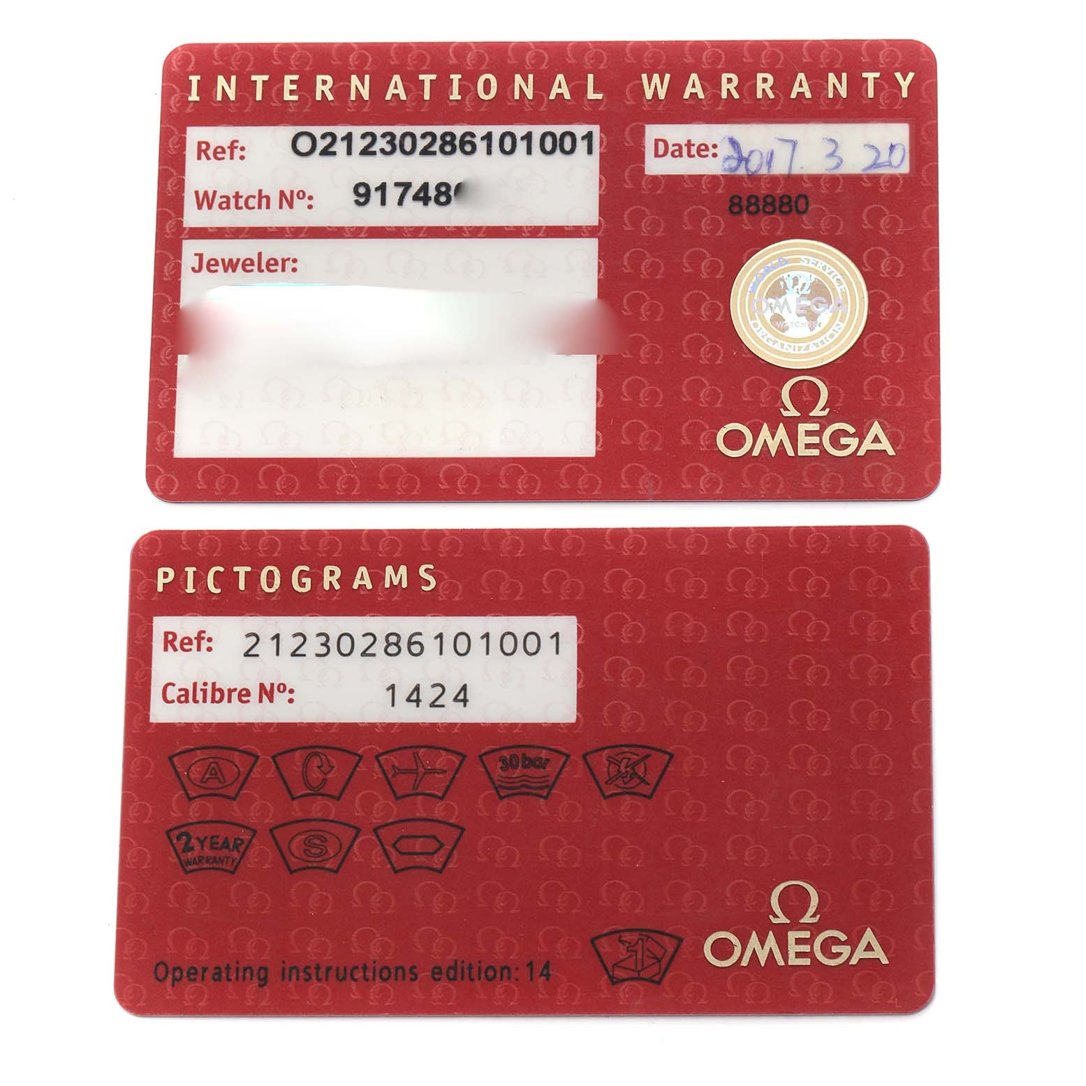 The image shows front views of the International Warranty and Pictograms cards for the Omega 212.30.28.61.01.001 Women
s Stainless Steel Black Dial Seamaster Diver 300M 28 Quartz Ladies Watch.