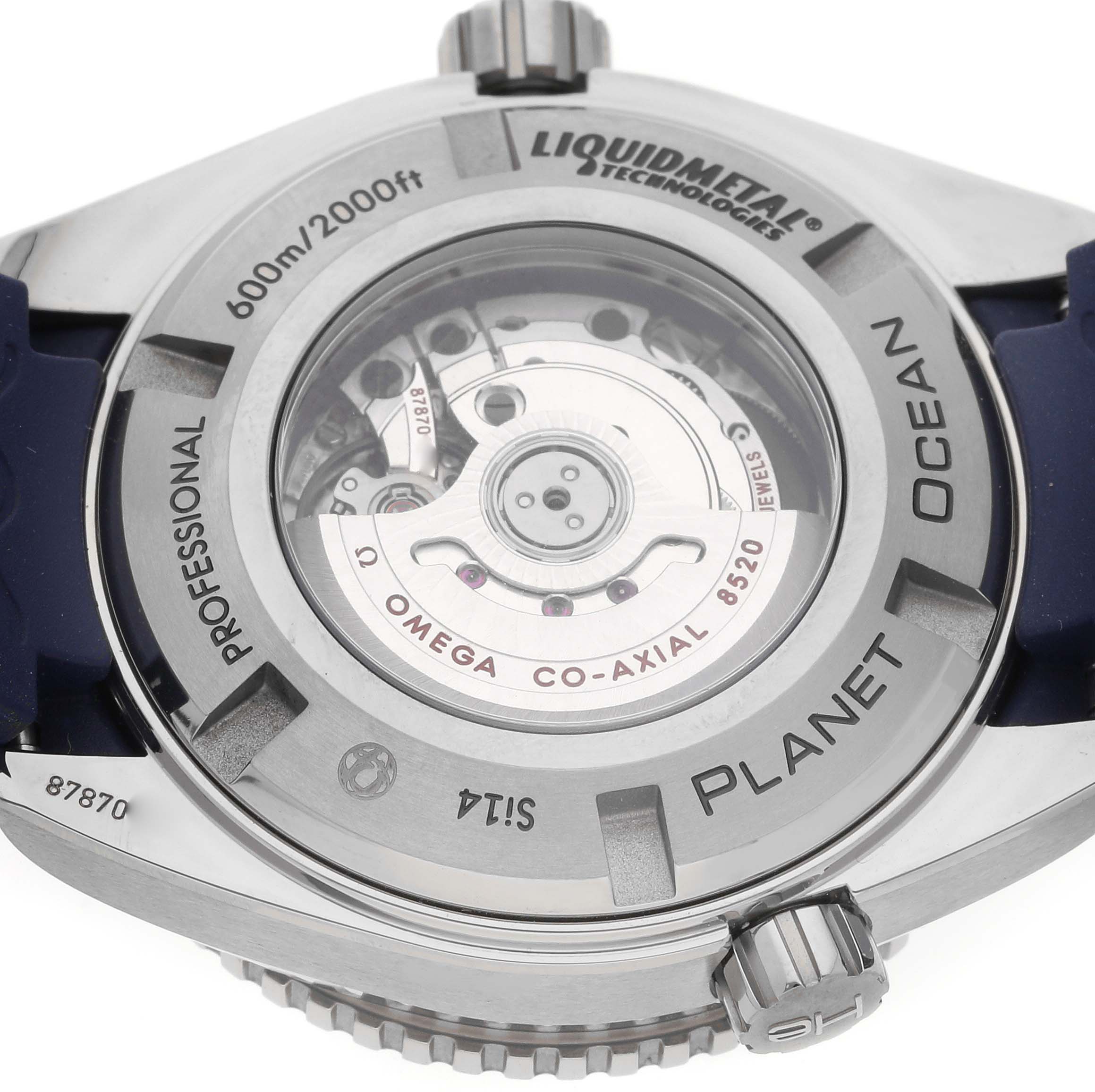 The image shows the case back of the Omega Planet Ocean 232.92.38.20.03.001 Men
s Titanium Blue Dial 232.92.38.20.03.001 Men
s Titanium Blue Dial watch, highlighting the movement and inscriptions.