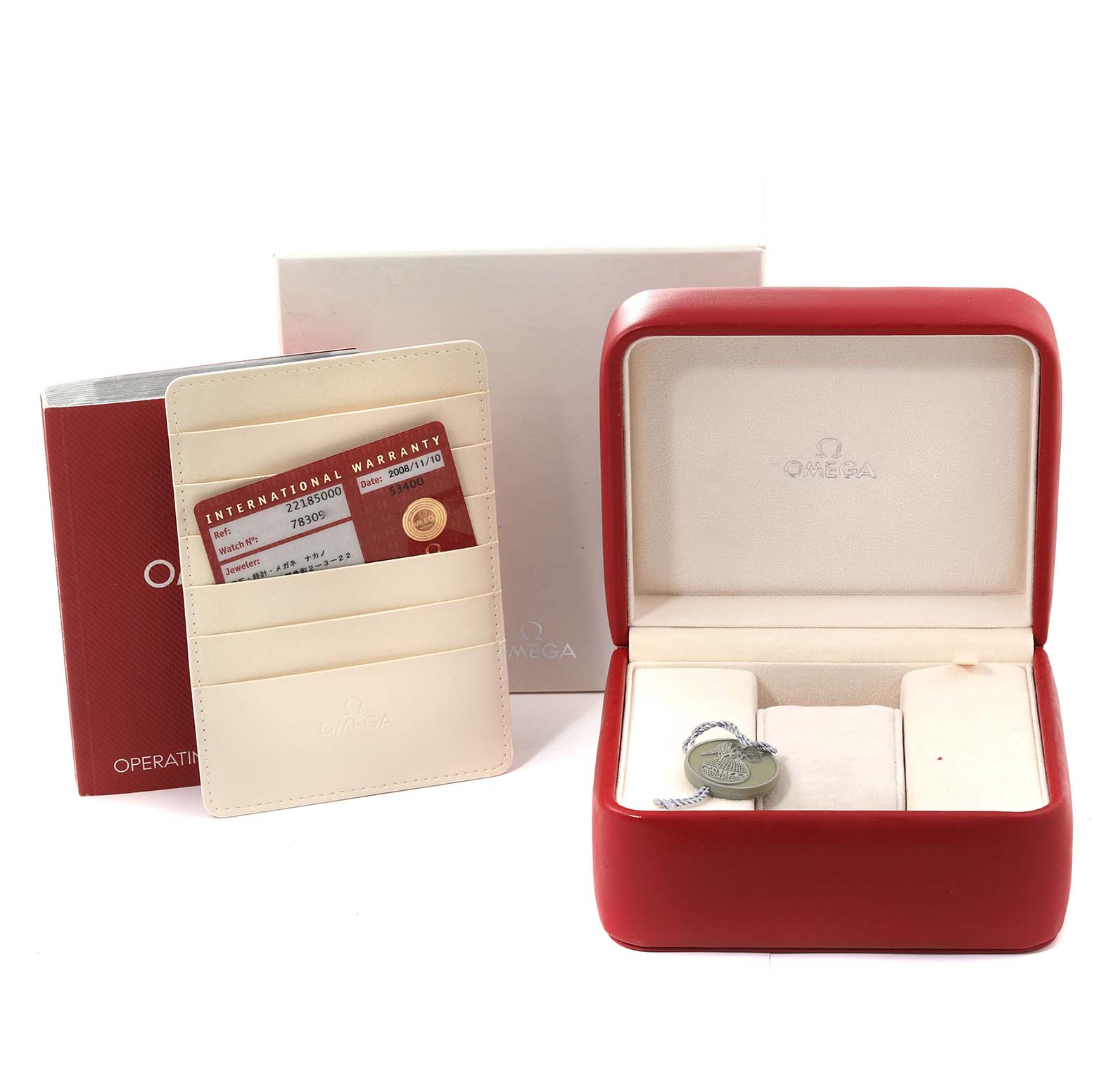 The image shows the Omega Planet Ocean 2218.50.00 Men's Stainless Steel Black Dial 2218.50.00 Men's Stainless Steel Black Dial watch's accessories, including a red watch box, warranty card, instruction manual, and additional packaging.