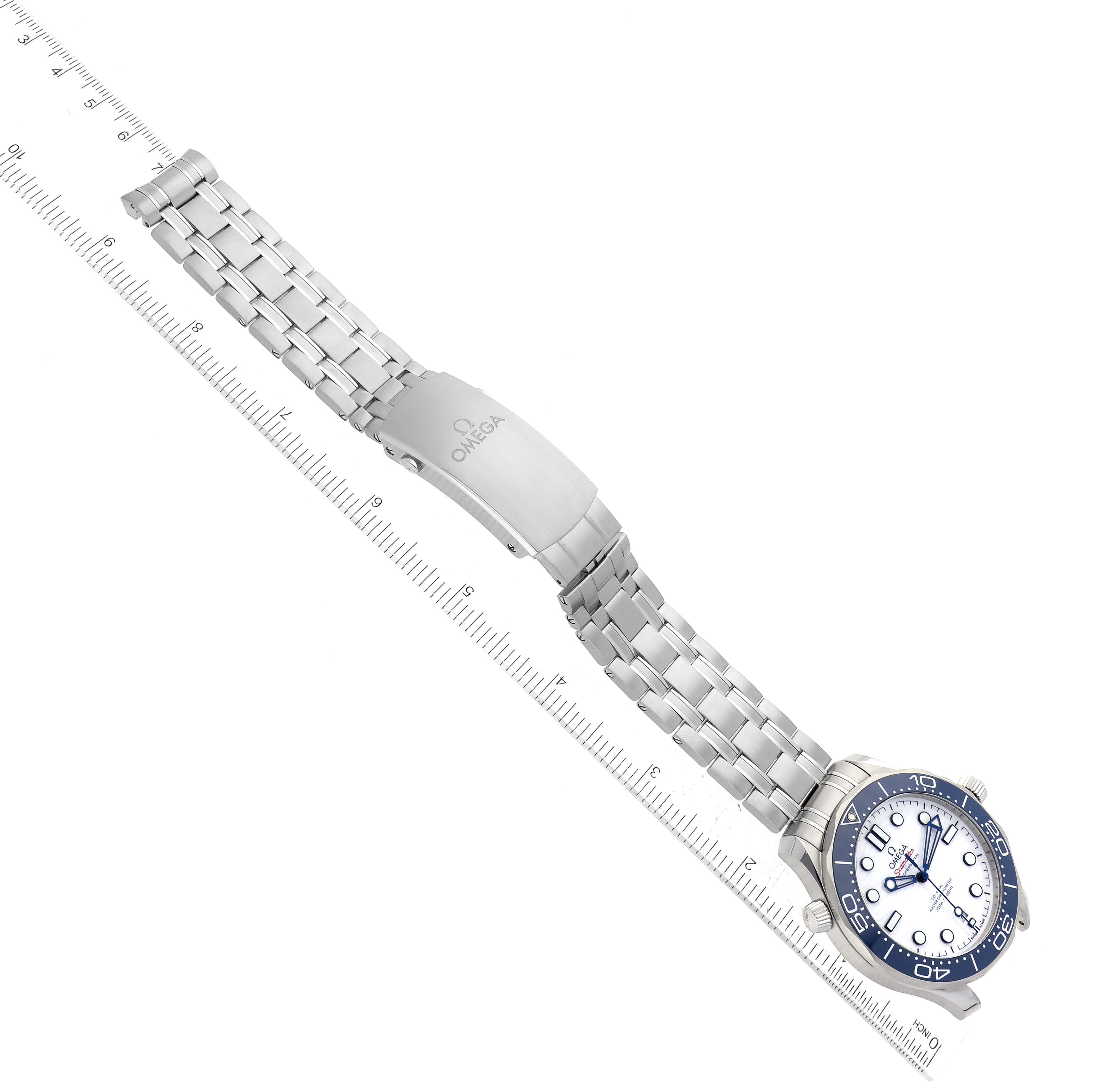 The Omega Seamaster 522.30.42.20.04.001 Men
s Stainless Steel White Dial 522.30.42.20.04.001 Men
s Stainless Steel White Dial watch is shown from a top view, displaying its face, bezel, and metal bracelet with clasp.