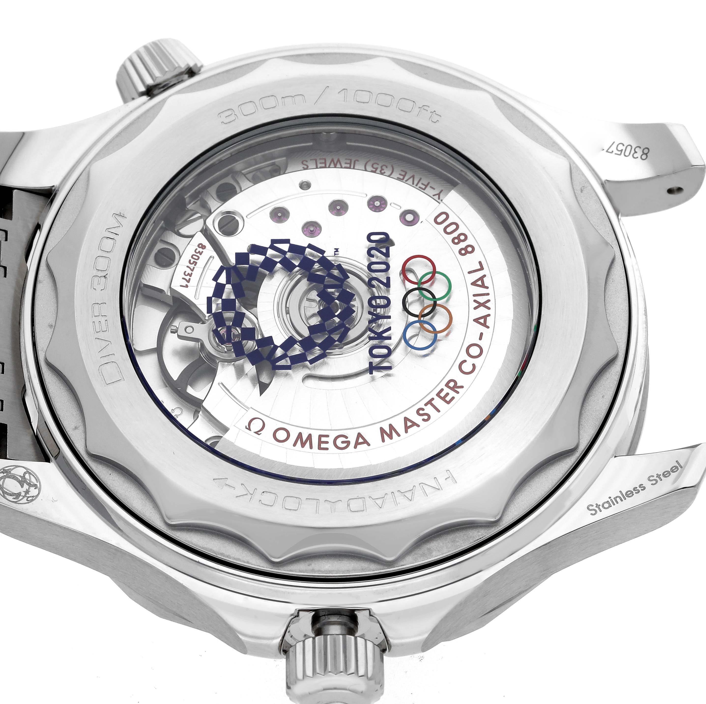 This image shows the back view of the Omega Seamaster 522.30.42.20.04.001 Men
s Stainless Steel White Dial 522.30.42.20.04.001 Men
s Stainless Steel White Dial watch, highlighting the movement and engraved details.