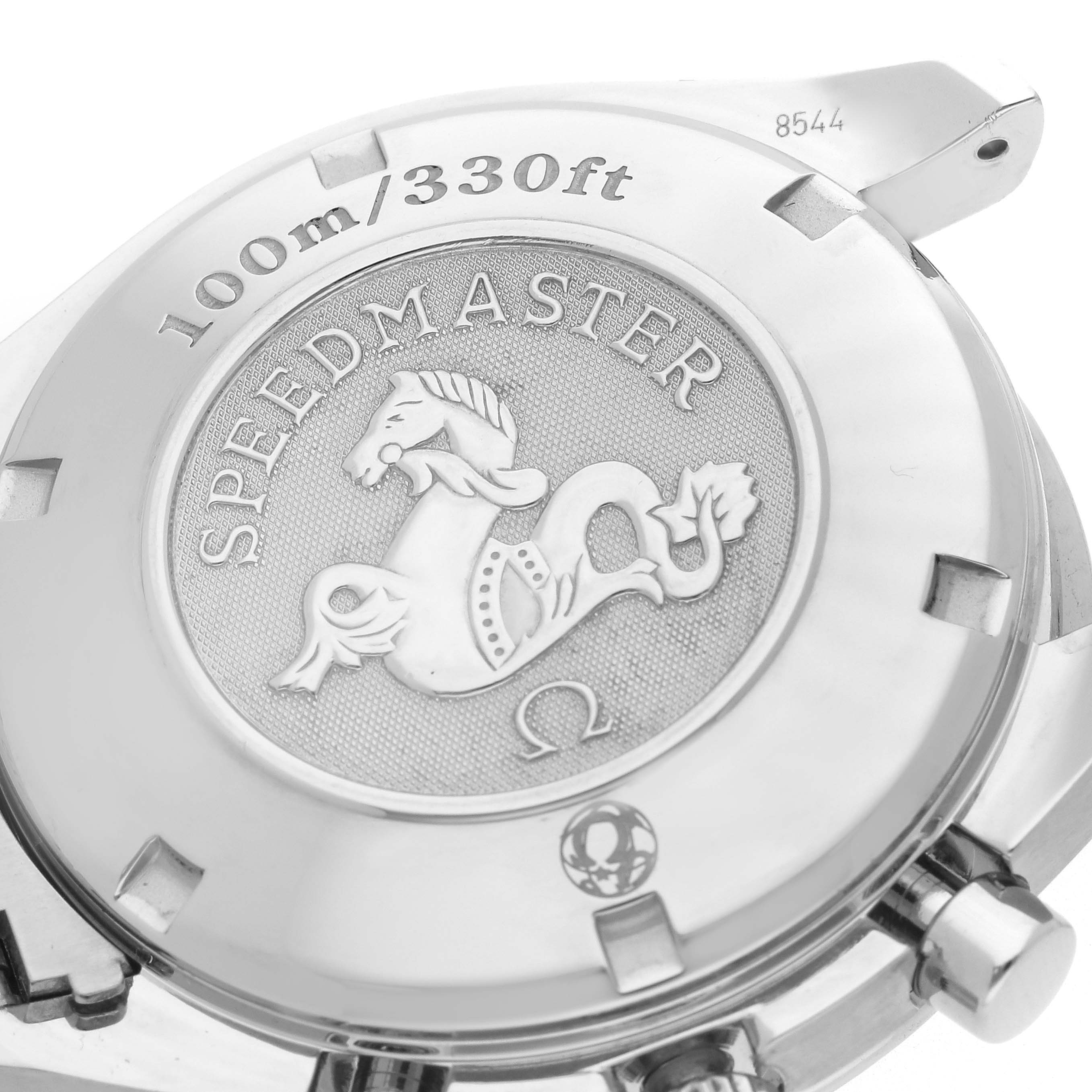 The image shows the case back of an Omega Speedmaster 3210.51.00 Men
s Stainless Steel Black Dial, highlighting the embossed logo and "100m/330ft" water resistance marking.