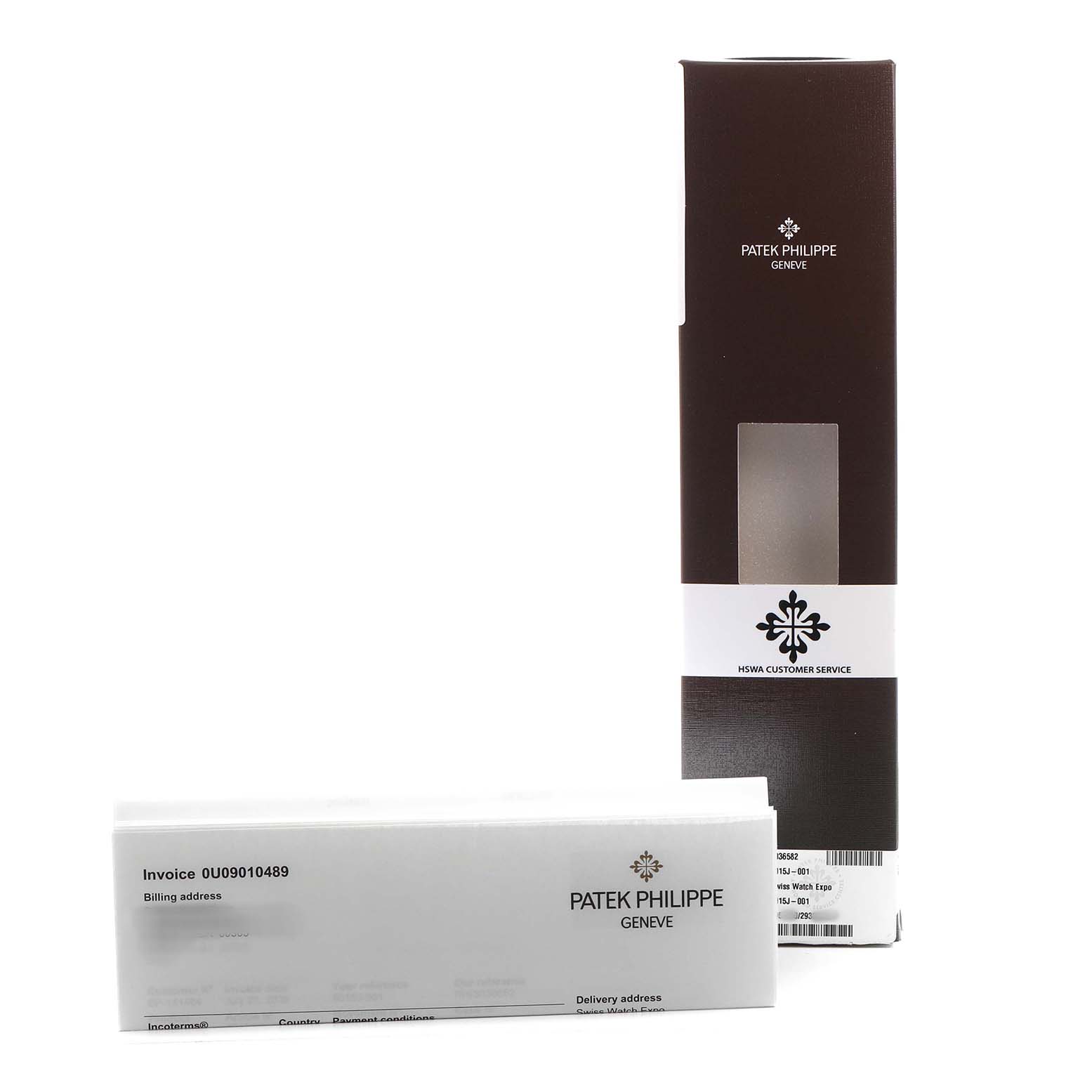 This image shows the packaging and service documents for a Patek Philippe Calatrava 5015J-001 Men's Yellow Gold White Dial watch, not the watch itself.