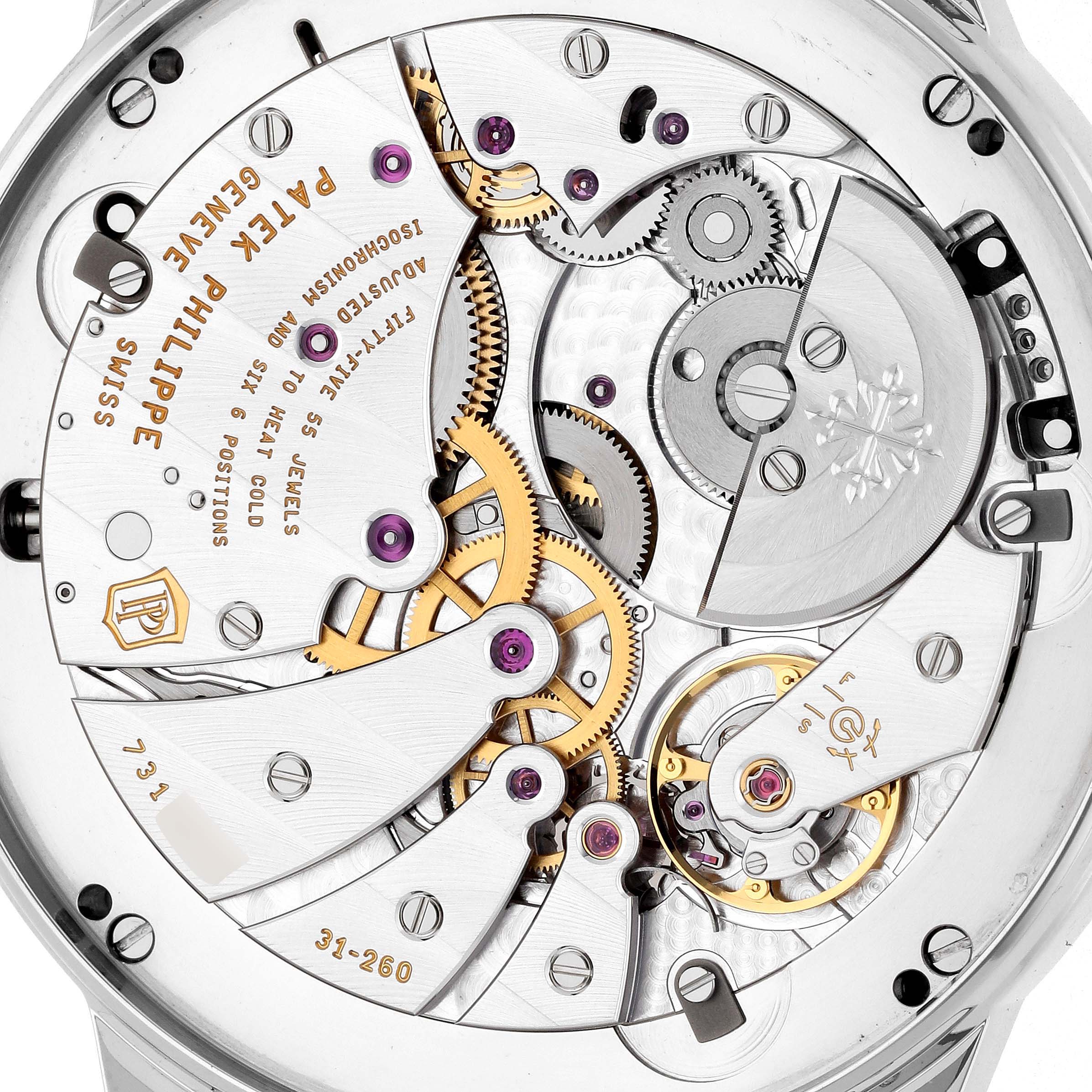 The image shows a detailed close-up of the movement of a Patek Philippe Complications 5236P-001 Men
s Platinum Blue Dial model from the back.