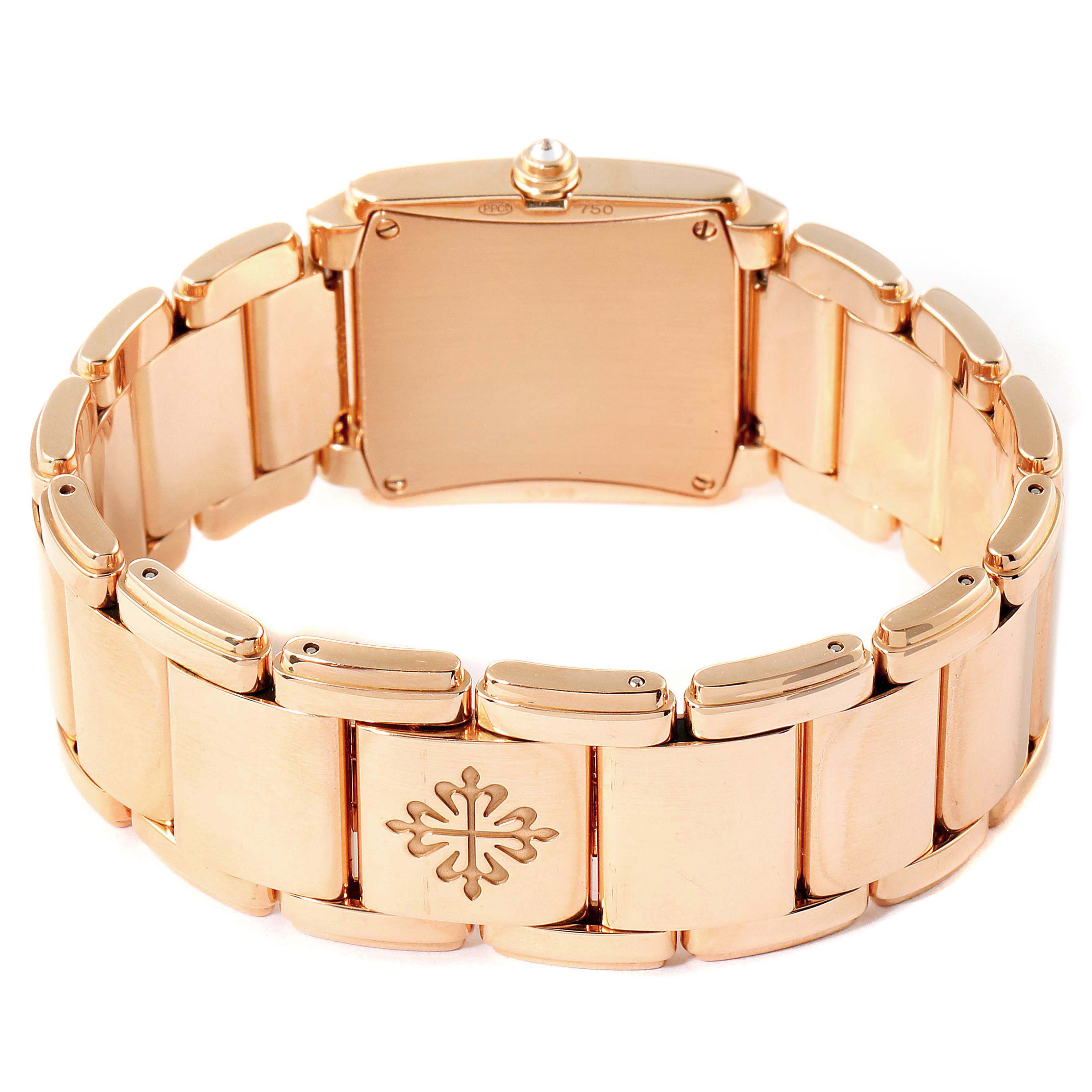 This image shows the back view of a Patek Philippe Twenty-4 4910/11R Women's Rose Gold Black Dial 4910/11R Women's Rose Gold Black Dial model watch, highlighting the case and bracelet.