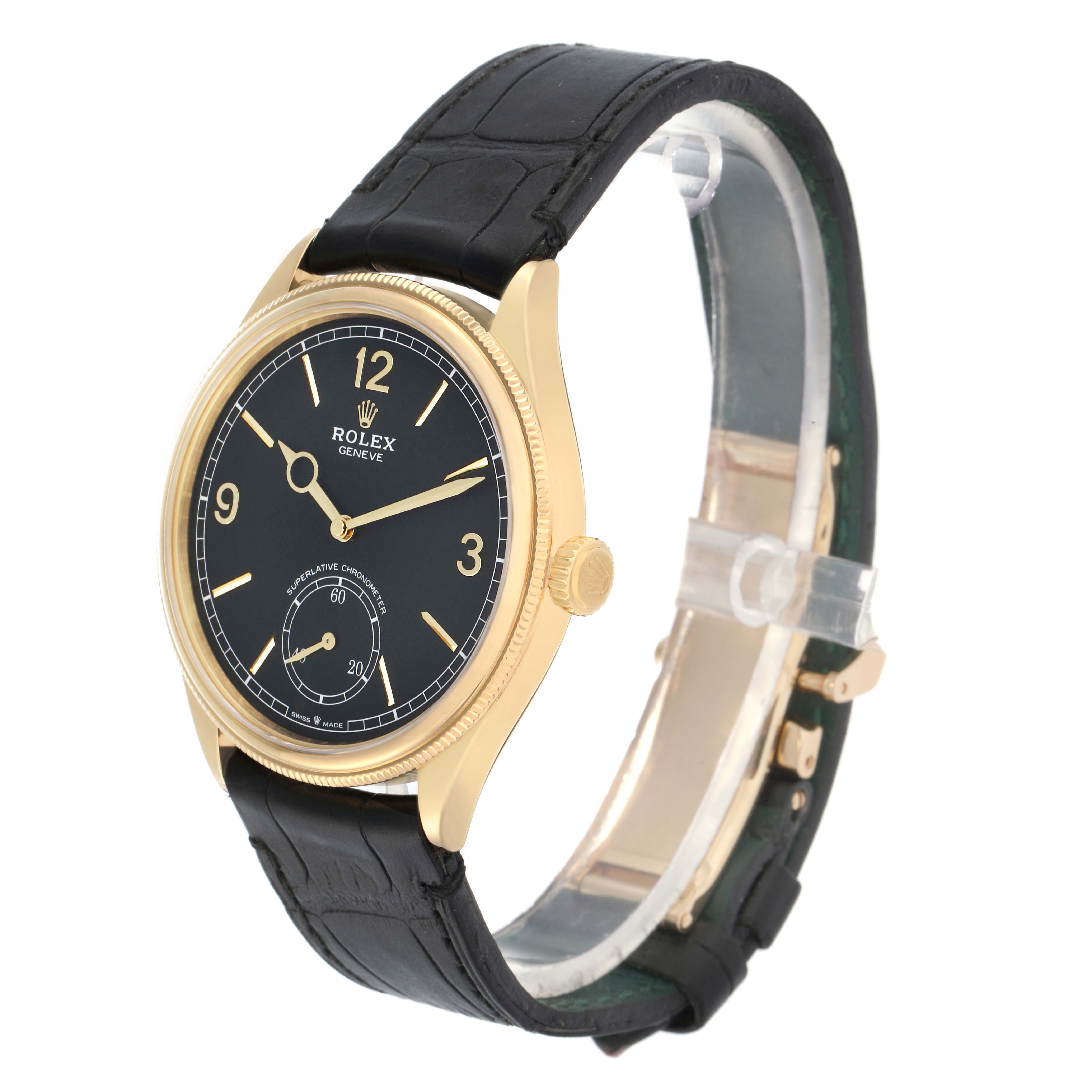 The Rolex 1908 52508 Men
s Yellow Gold Black Dial model is shown at a slight angle, featuring the case, dial, and leather strap.