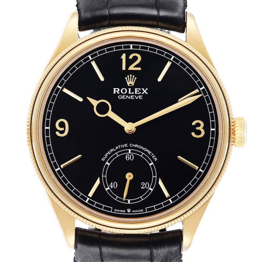 The Rolex 1908 52508 Men's Yellow Gold Black Dial model is shown from the front, highlighting the black dial, gold markers, and leather strap.