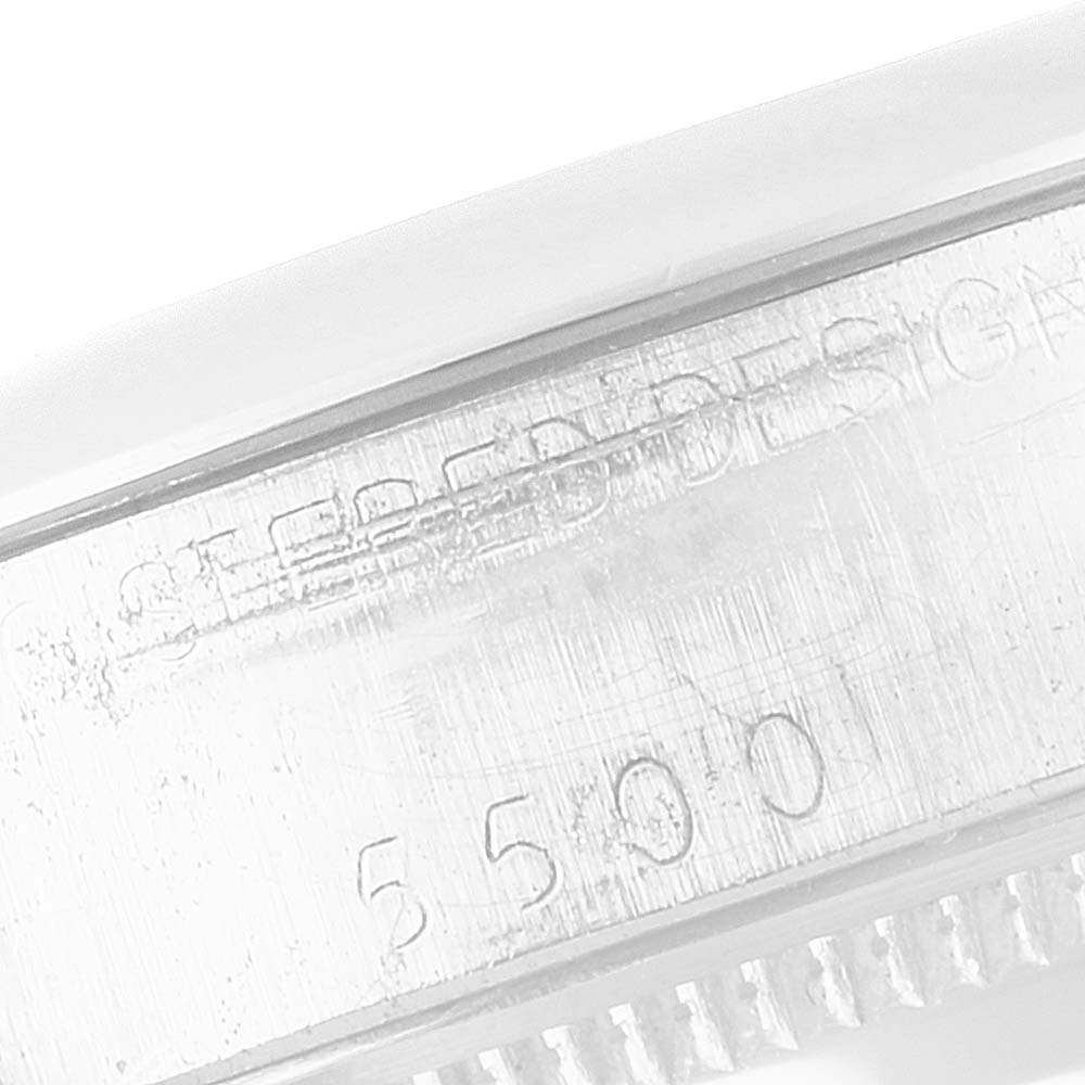 The image shows a close-up of the engraved serial number and lettering on the side of the Rolex Vintage Collection 5500 Men
s Stainless Steel Silver Dial 5500 Men
s Stainless Steel Silver Dial model case.