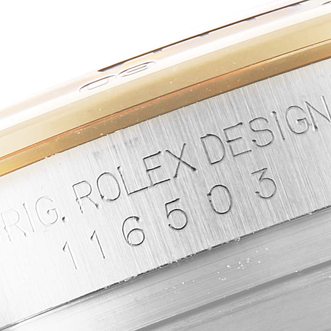 The image shows a close-up view of the engraved case side of the Rolex Daytona 116503 Men
s Steel and Gold (two tone) Champagne Dial 116503 Men
s Steel and Gold (two tone) Champagne Dial watch, revealing the model number 116503.