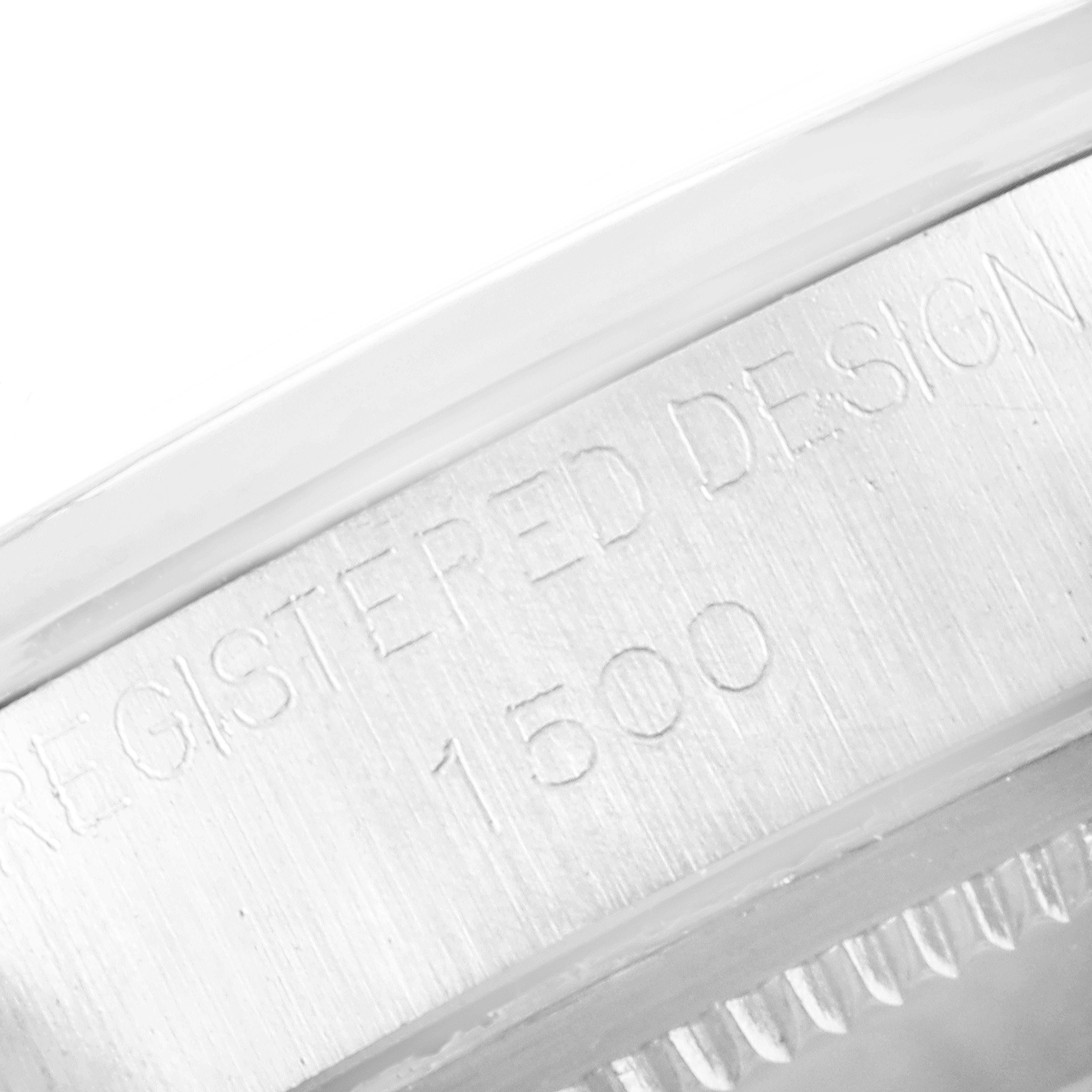 The image shows a close-up of the side bezel and engraved serial number on a Rolex Vintage Collection 1500 Men
s Stainless Steel Silver Dial 1500 Men
s Stainless Steel Silver Dial model watch.