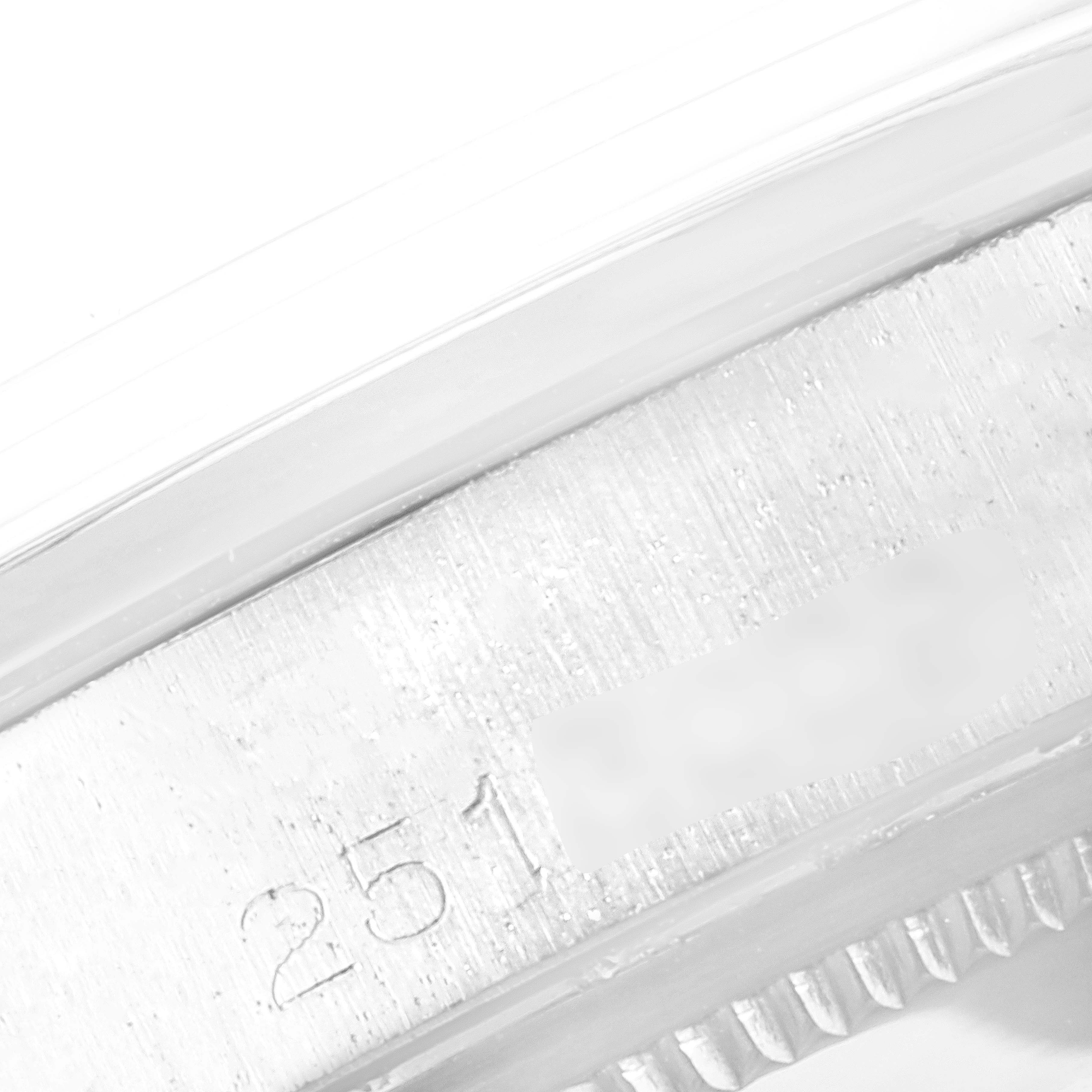 This image shows a close-up of the serial number engraving on the side of the Rolex Vintage Collection 1500 Men
s Stainless Steel Silver Dial 1500 Men
s Stainless Steel Silver Dial watch case.