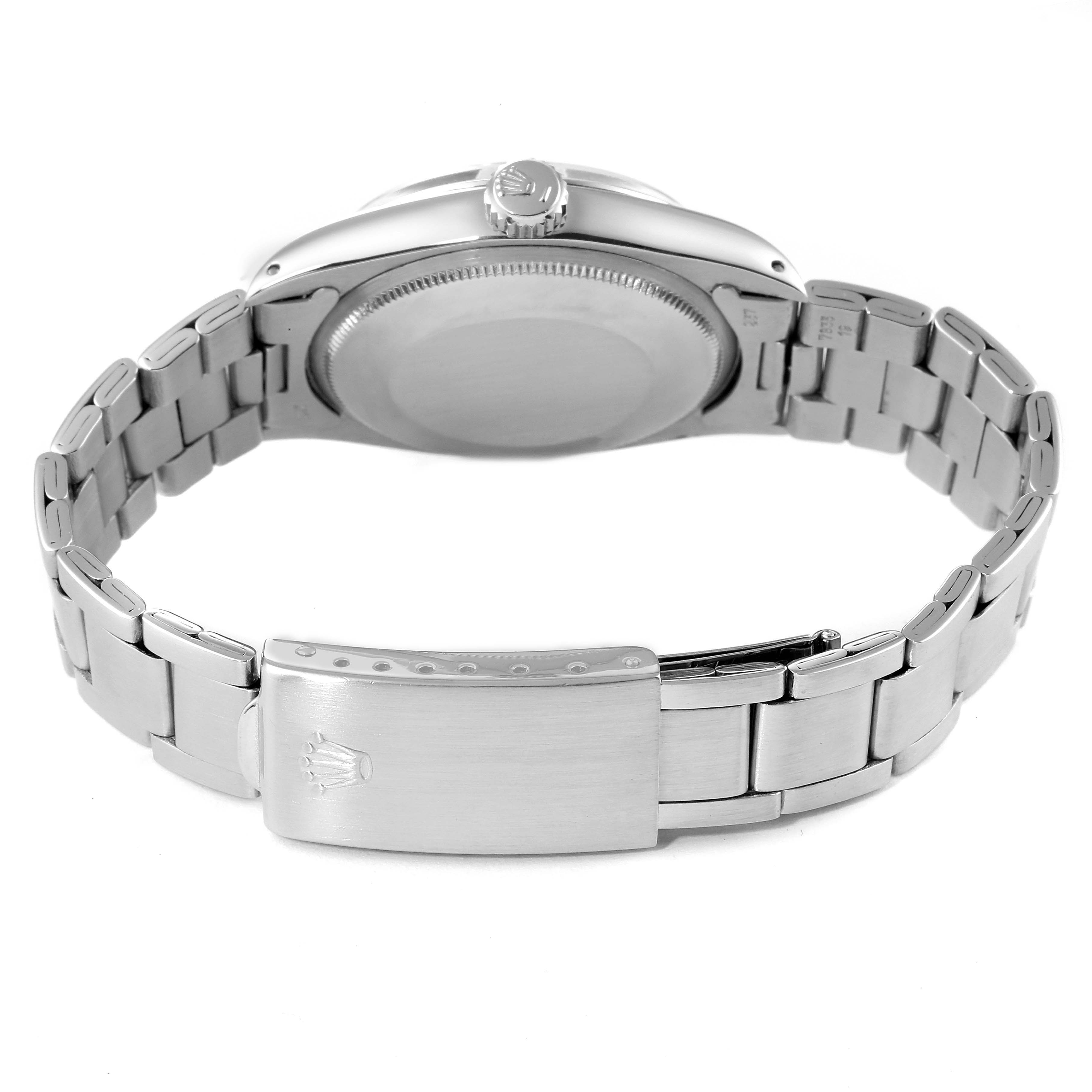 This image shows the back side of the Rolex Vintage Collection 1500 Men
s Stainless Steel Silver Dial 1500 Men
s Stainless Steel Silver Dial watch, highlighting the bracelet and clasp.