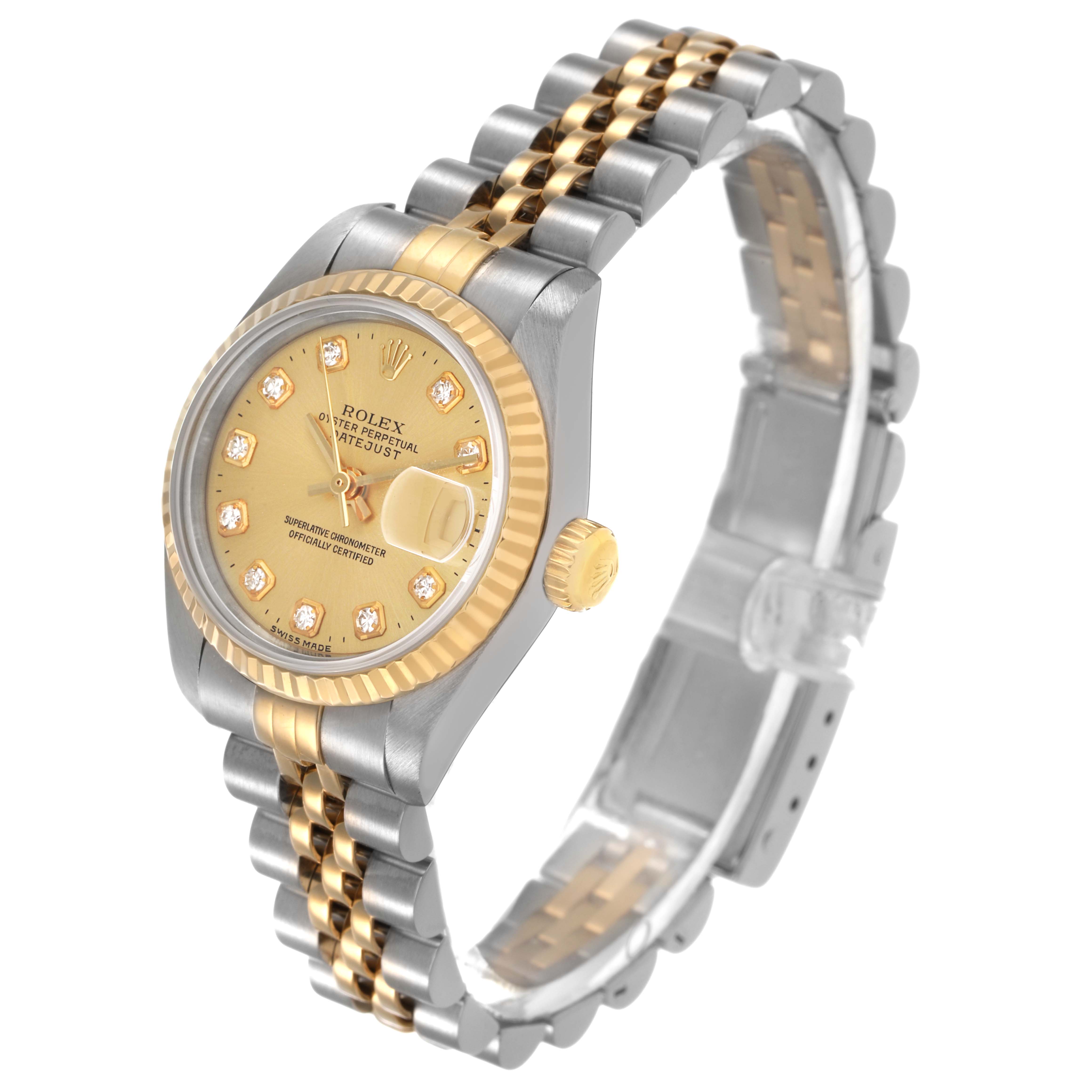 The Rolex Datejust 69173 Women's Steel and Gold (two tone) Champagne Dial is shown at an oblique angle, highlighting the gold and silver bracelet, fluted bezel, and dial with diamond markers.