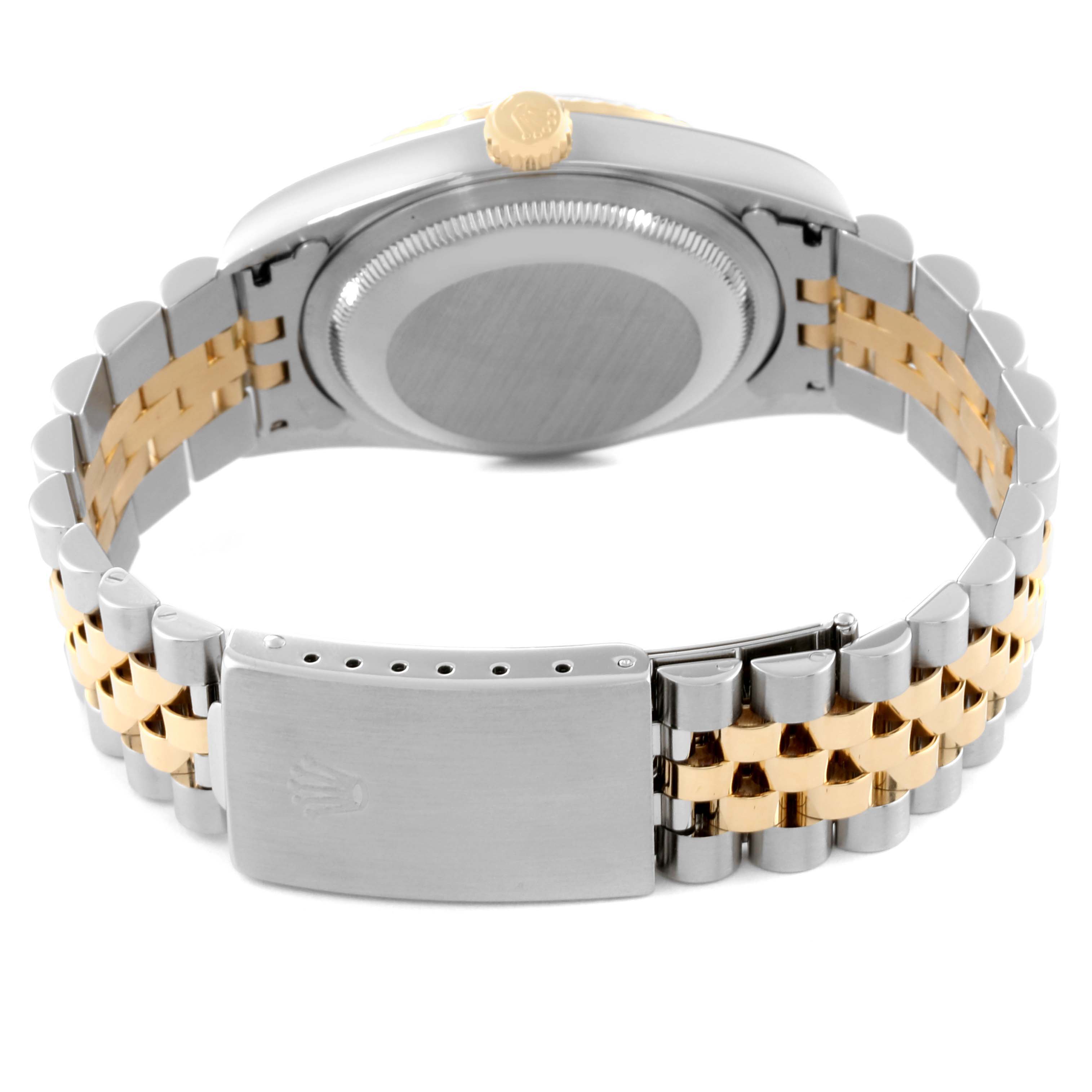 The image shows the back view of a Rolex Datejust 16233 Men's Steel and Gold (two tone) Black Dial 16233 Men's Steel and Gold (two tone) Black Dial watch, highlighting the case back, crown, and two-tone bracelet with clasp.