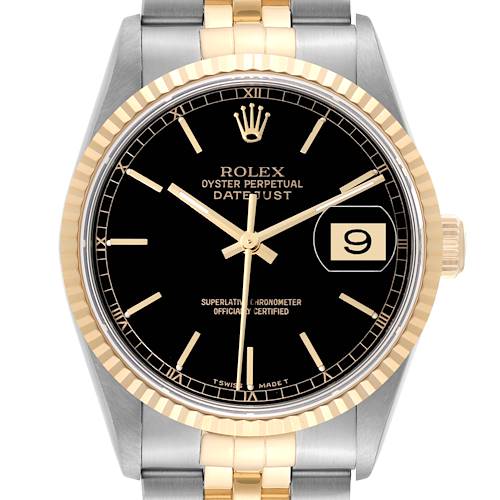 This image shows a Rolex Datejust watch from the front, highlighting its black dial, gold bezel, and two-tone metal bracelet.