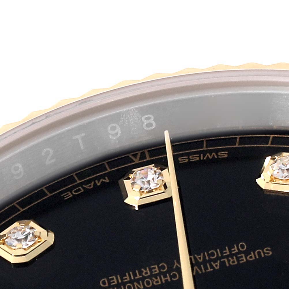 This image shows a close-up of the dial and diamond hour markers of a Rolex Datejust 41 126333 Men's Steel and Gold (two tone) Black Dial 126333 Men's Steel and Gold (two tone) Black Dial watch.