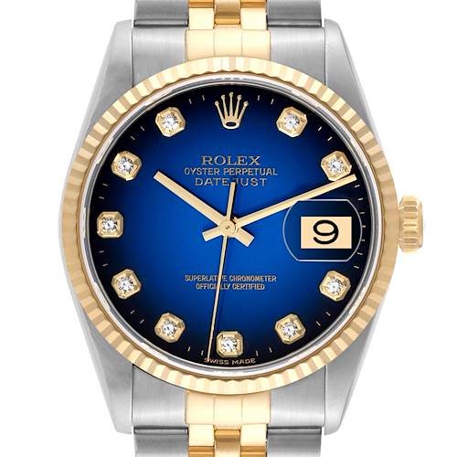 This image shows a Rolex Datejust model watch from a frontal angle, displaying the blue dial, gold markers, date window, and two-tone bracelet.