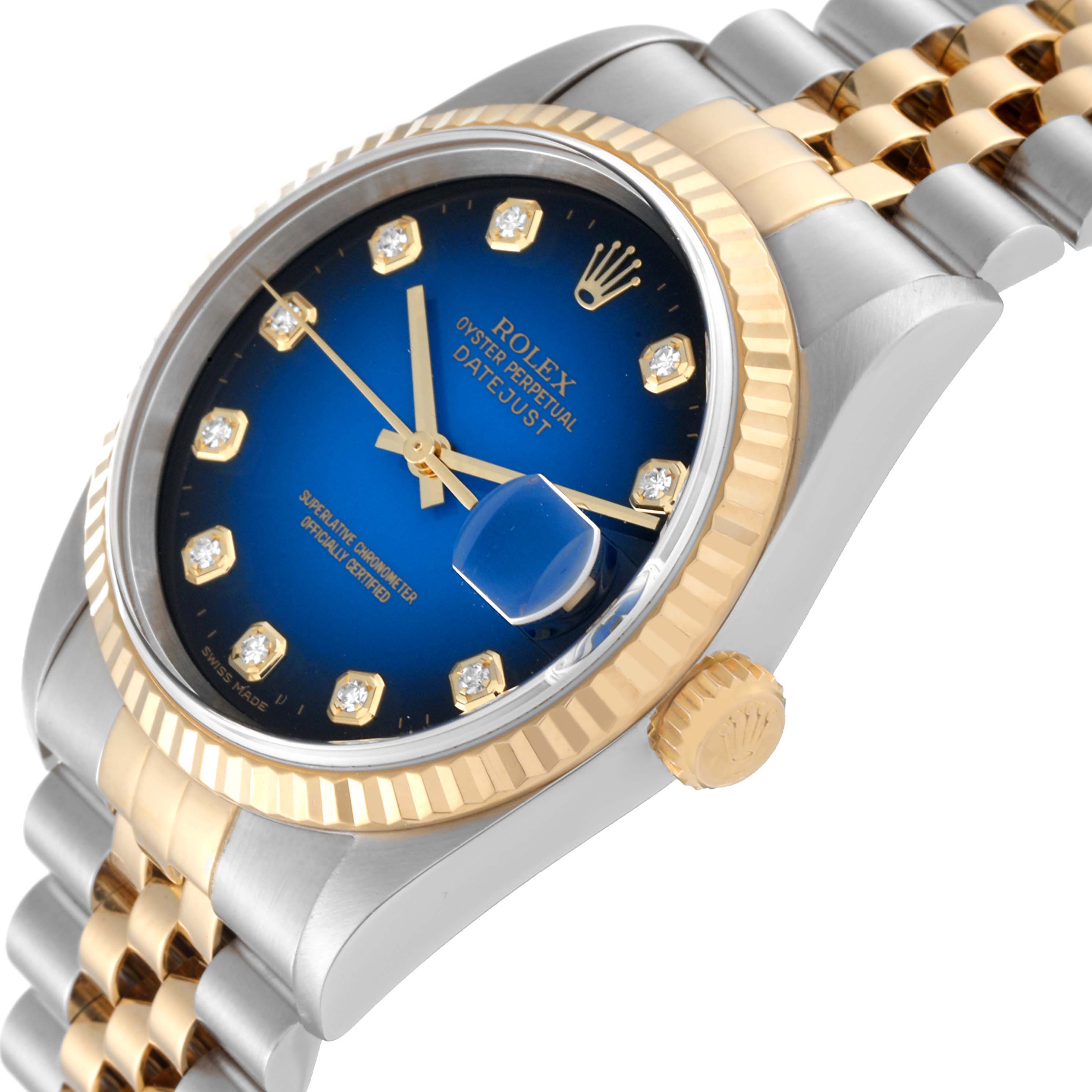The Rolex Datejust 16233 Men's Steel and Gold (two tone) Blue Dial 16233 Men's Steel and Gold (two tone) Blue Dial watch is shown at an angle highlighting the blue dial, crown, and two-tone bracelet.