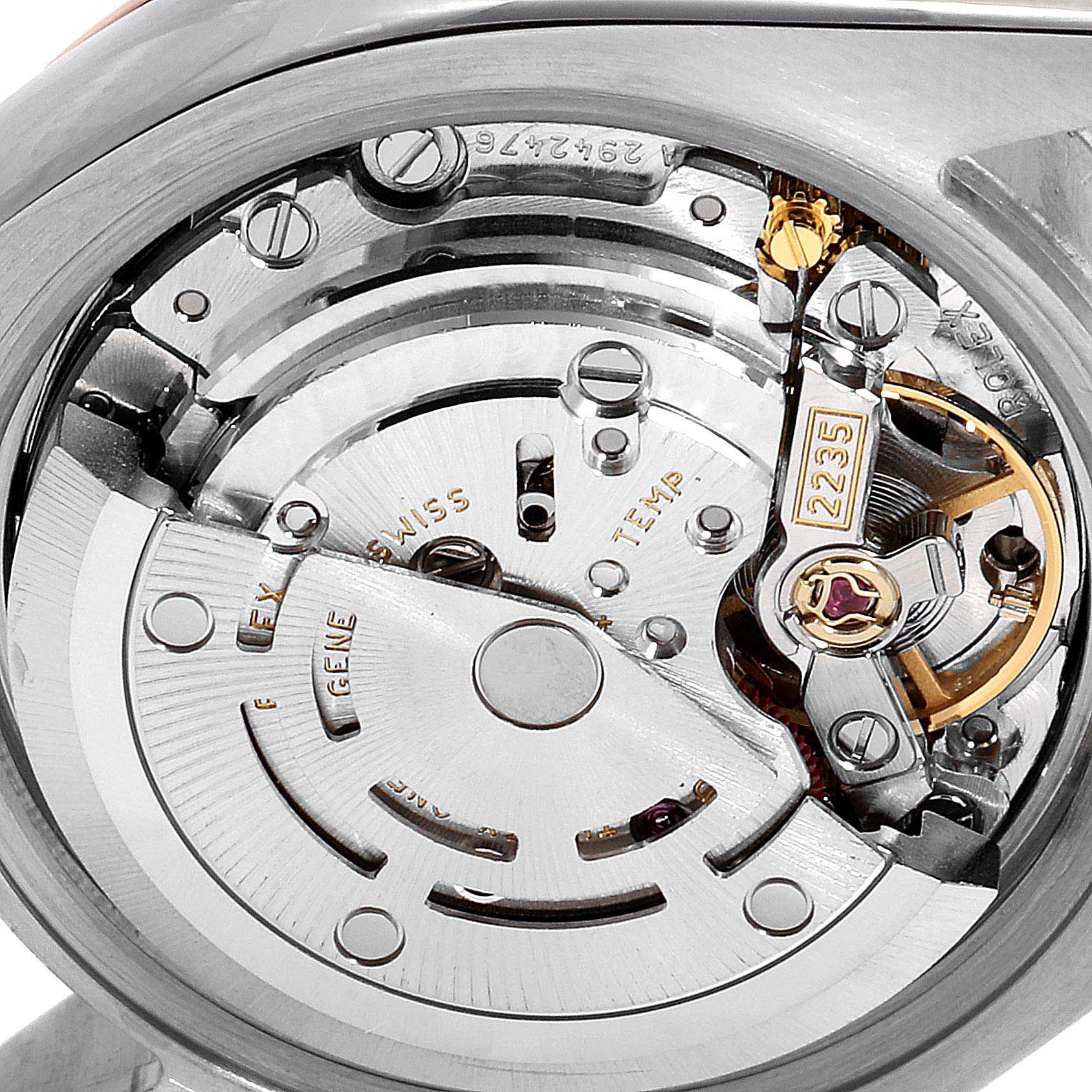 The image shows a close-up view of the movement mechanism of a Rolex Datejust 179171 Women's Steel and Gold (two tone) Pink Dial 179171 Women's Steel and Gold (two tone) Pink Dial model watch.