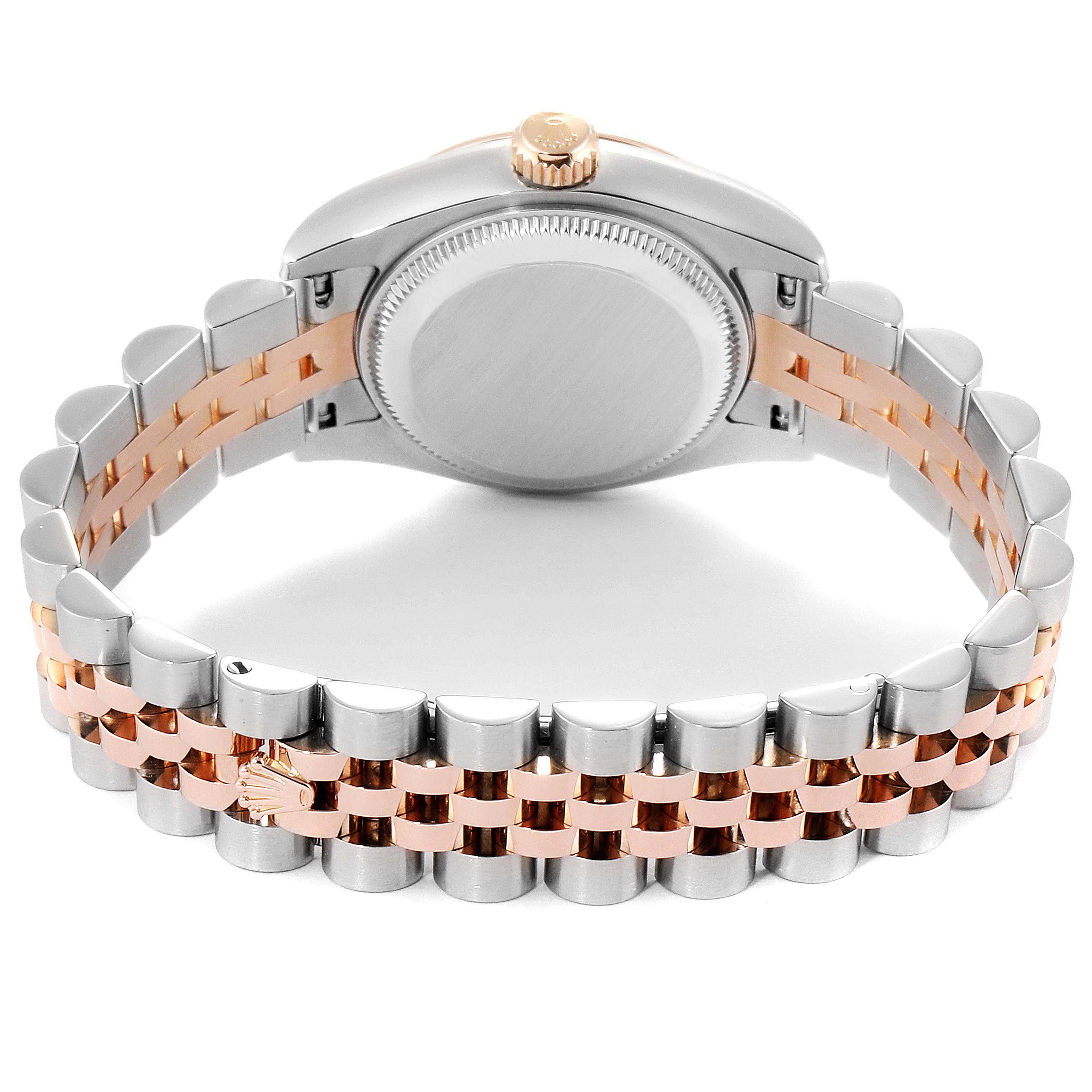This image shows the back case and bracelet of a Rolex Datejust 179171 Women's Steel and Gold (two tone) Pink Dial 179171 Women's Steel and Gold (two tone) Pink Dial watch in a mix of silver and rose gold.