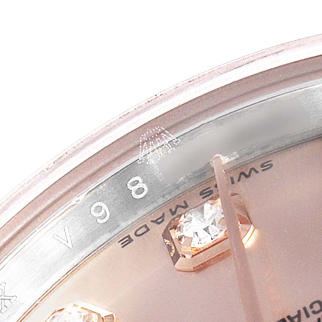 The image shows a close-up of the dial and part of the bezel of a Rolex Datejust 179171 Women's Steel and Gold (two tone) Pink Dial 179171 Women's Steel and Gold (two tone) Pink Dial watch.