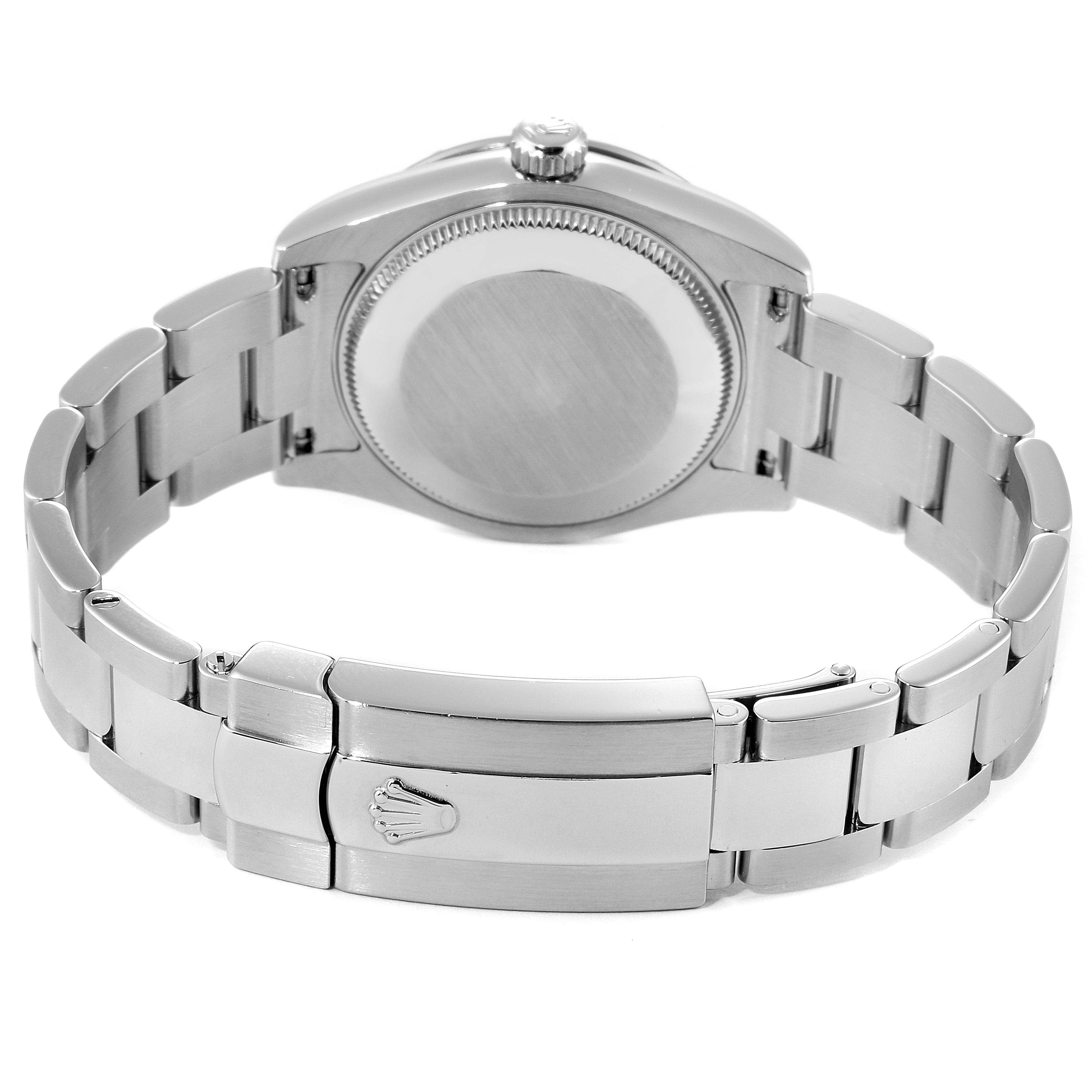 The image shows the back and clasp of a Rolex Mid-Size 178344 Women
s Stainless Steel Silver Dial 178344 Women
s Stainless Steel Silver Dial watch, featuring its brushed metal bracelet and crown logo on the clasp.