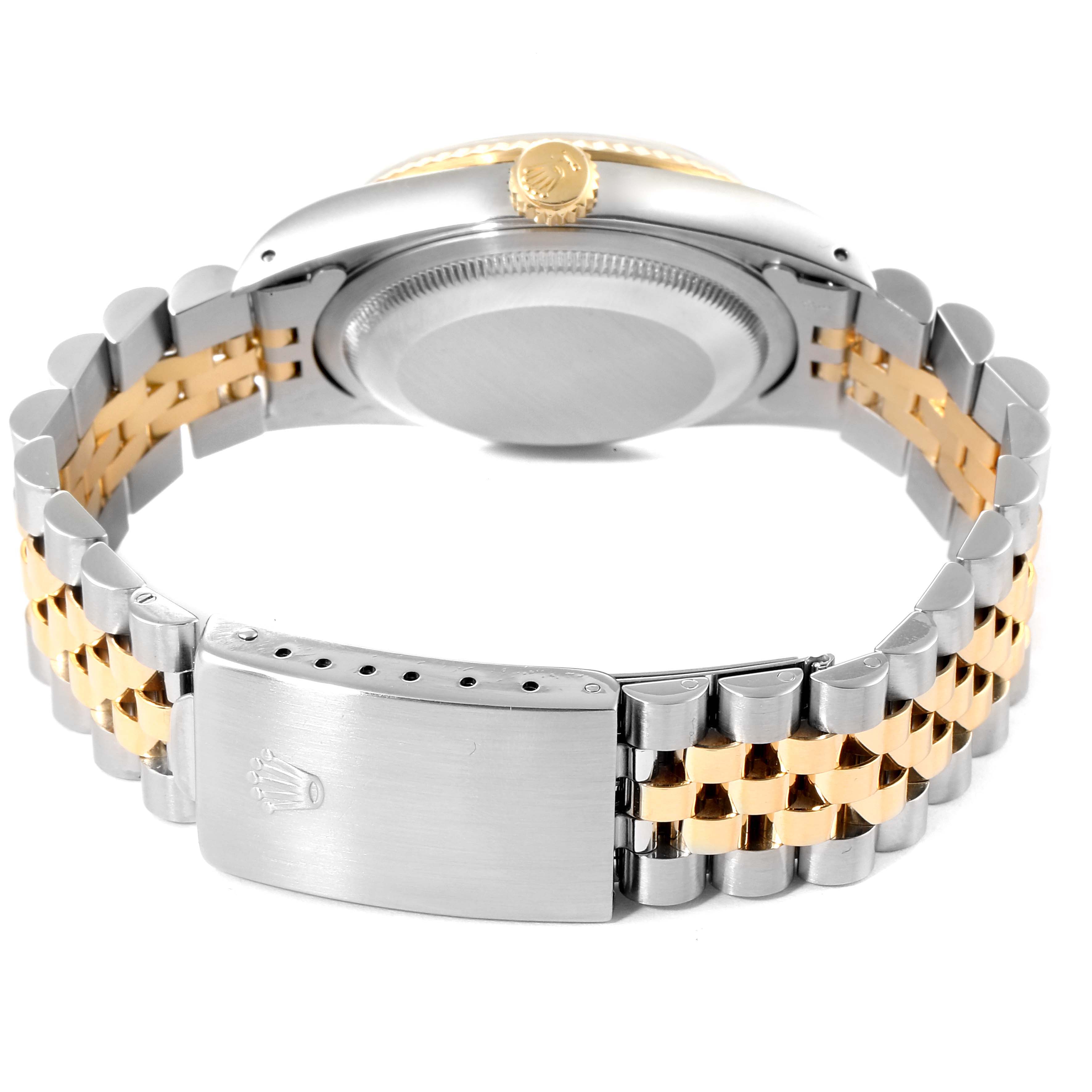 This image shows the back of a Rolex Datejust 16233 Men's Steel and Gold (two tone) Champagne Dial 16233 Men's Steel and Gold (two tone) Champagne Dial watch with its clasp, jubilee bracelet, and crown.