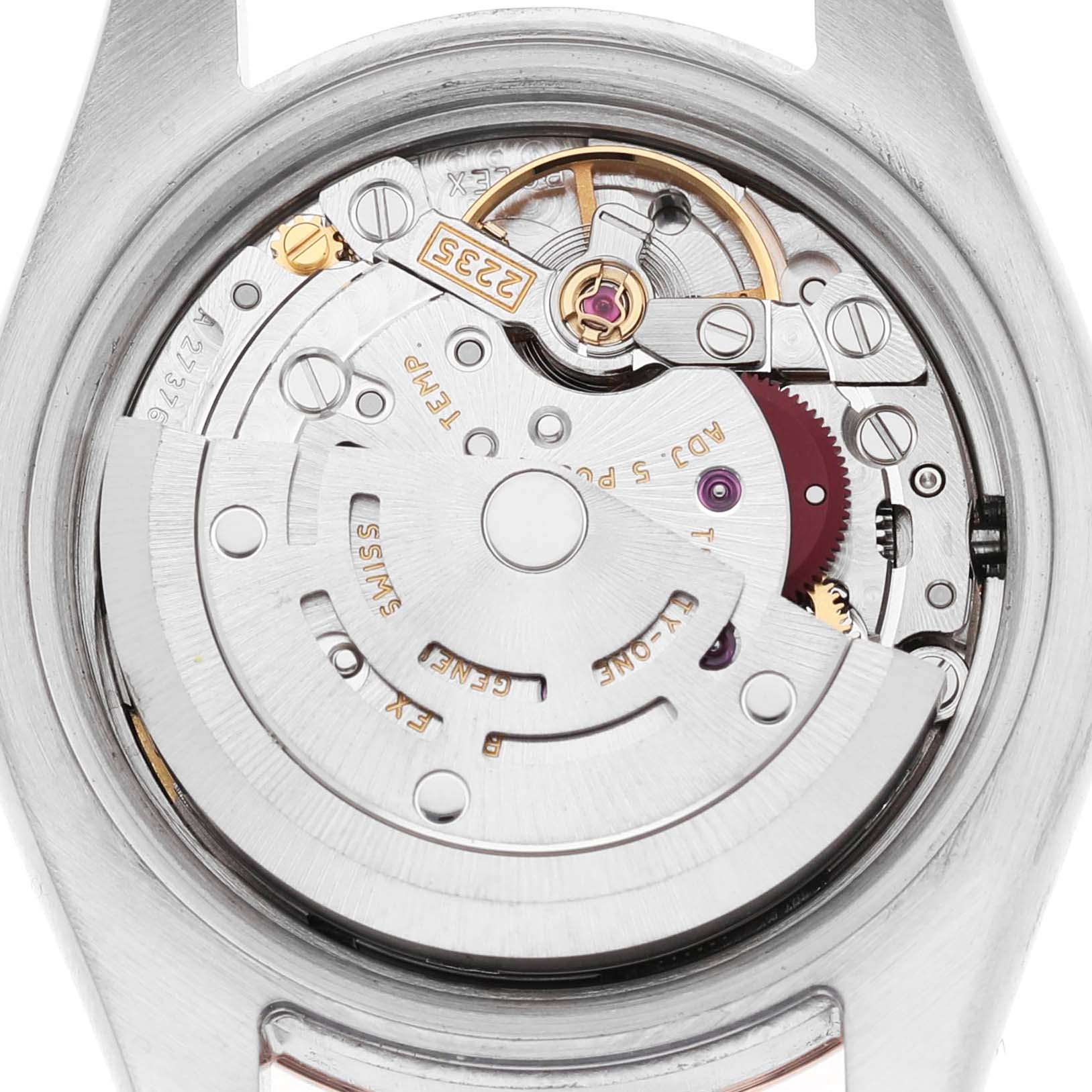 The image shows the movement of a Rolex Datejust 179171 Women's Stainless Steel Pink Dial watch from the back, revealing gears and inner mechanisms.
