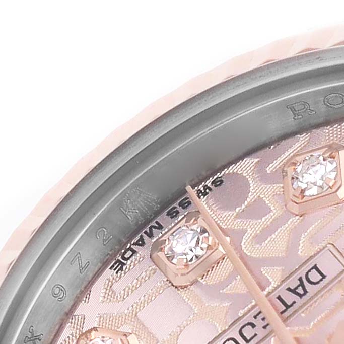 The image shows a close-up of the Rolex Datejust 179171 Women's Stainless Steel Pink Dial watch face, highlighting diamond markers and part of the bezel.