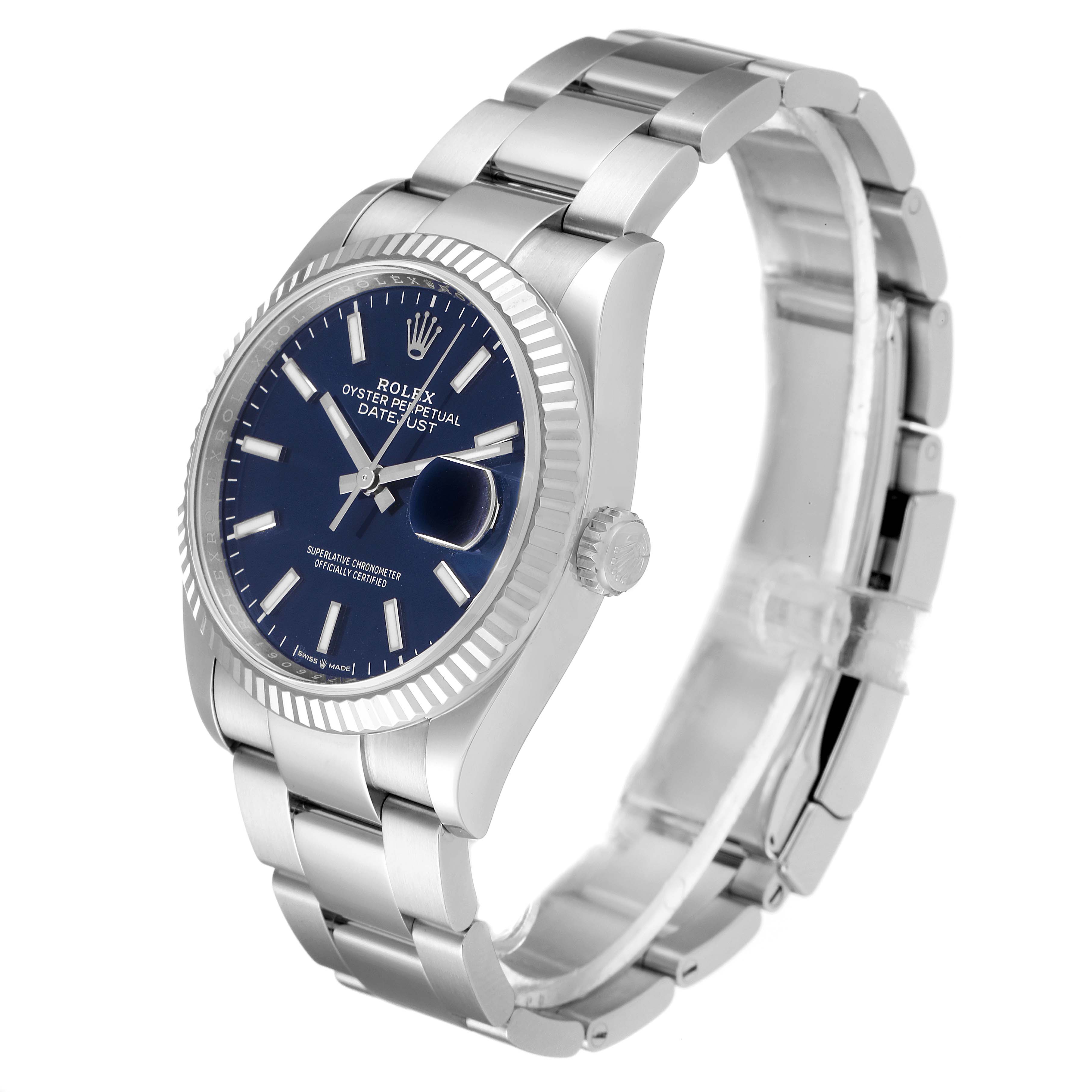 The image shows a Rolex Datejust 126234 Men's Stainless Steel Blue Dial 126234 Men's Stainless Steel Blue Dial watch from an angled side view, highlighting the face, bezel, crown, and metal bracelet.