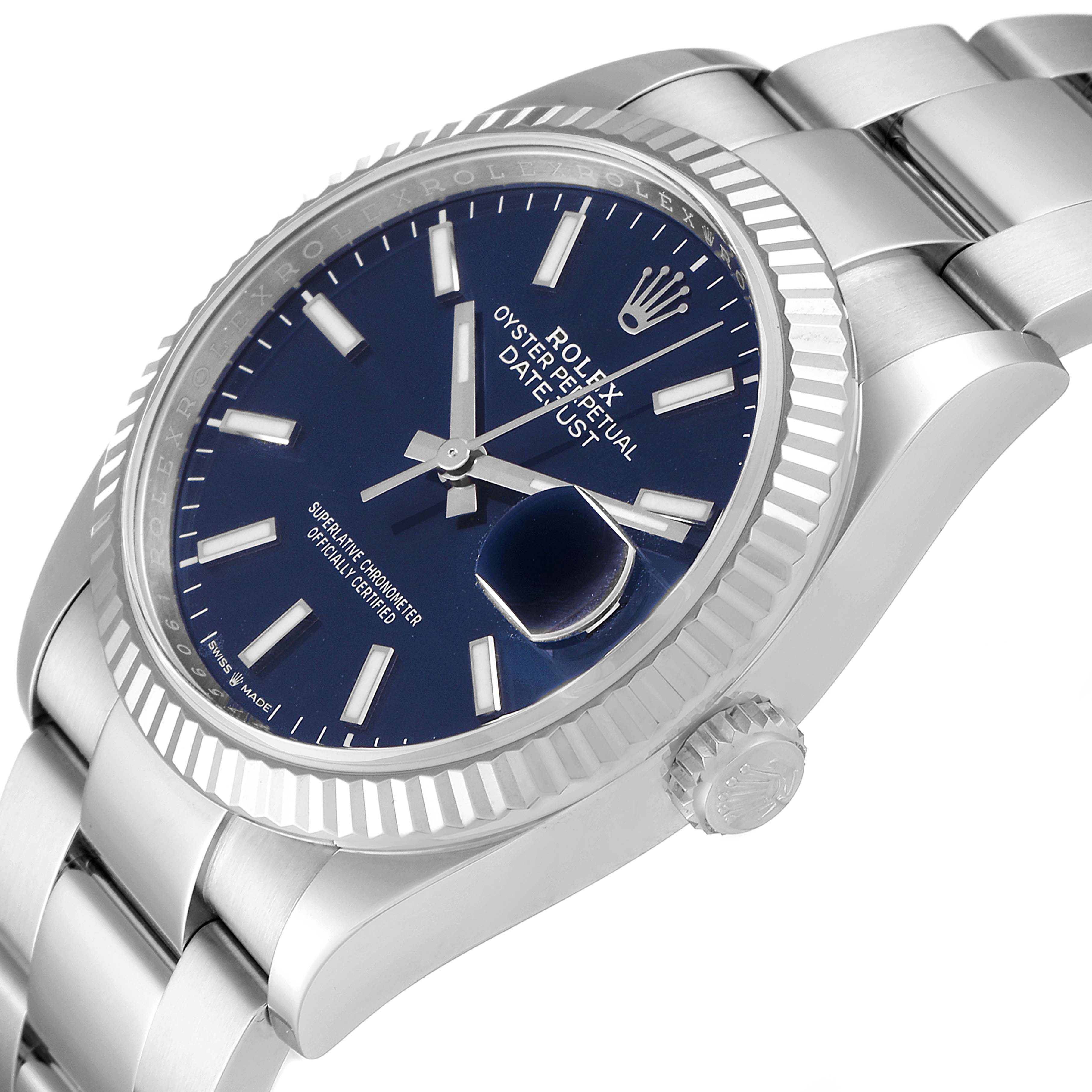 This image shows a Rolex Datejust 126234 Men's Stainless Steel Blue Dial 126234 Men's Stainless Steel Blue Dial watch at an oblique angle, highlighting the blue dial, bezel, and part of the bracelet.