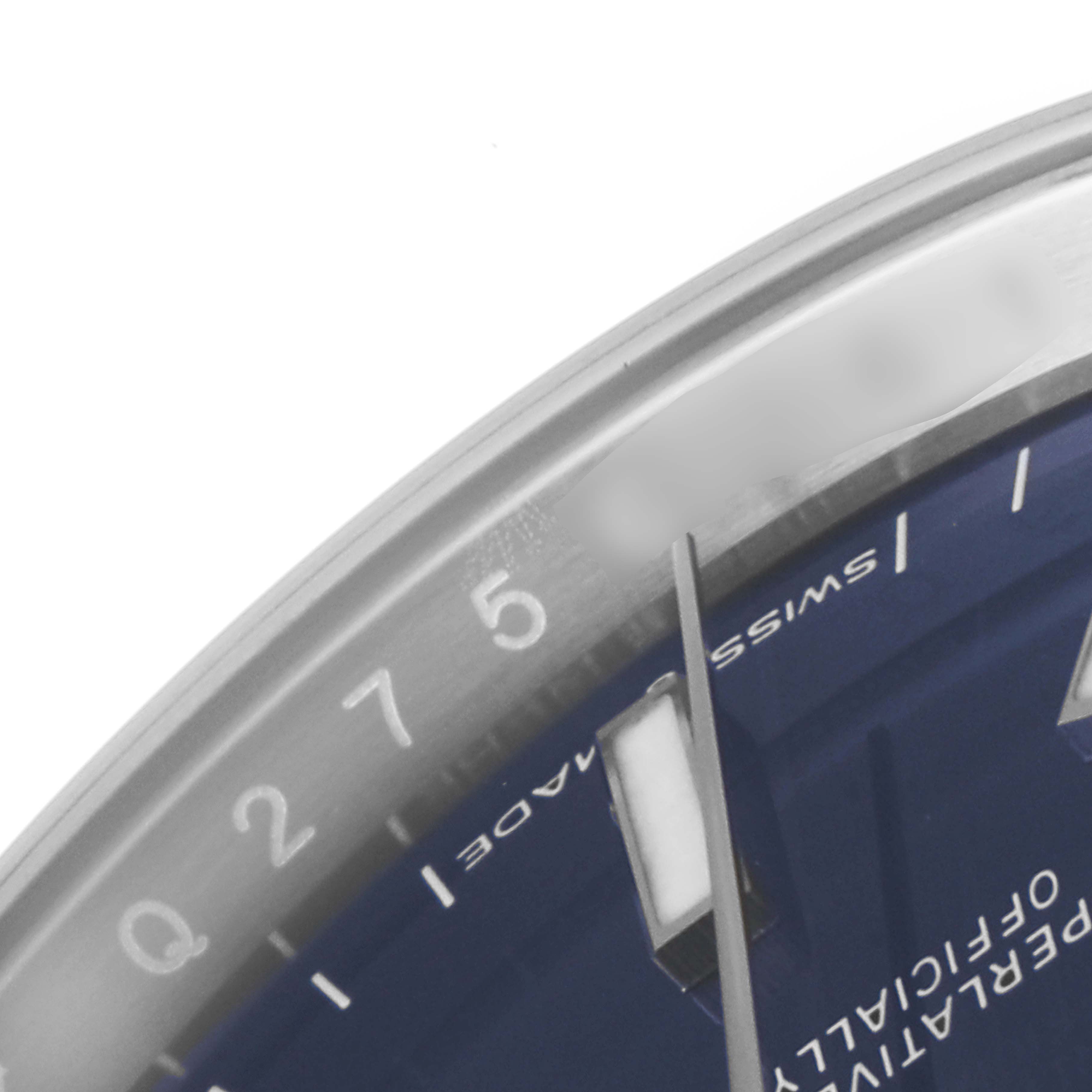 The image shows a close-up of the Rolex Datejust 126234 Men's Stainless Steel Blue Dial 126234 Men's Stainless Steel Blue Dial model, focusing on the dial's outer ring, hour markers, and partial hands.