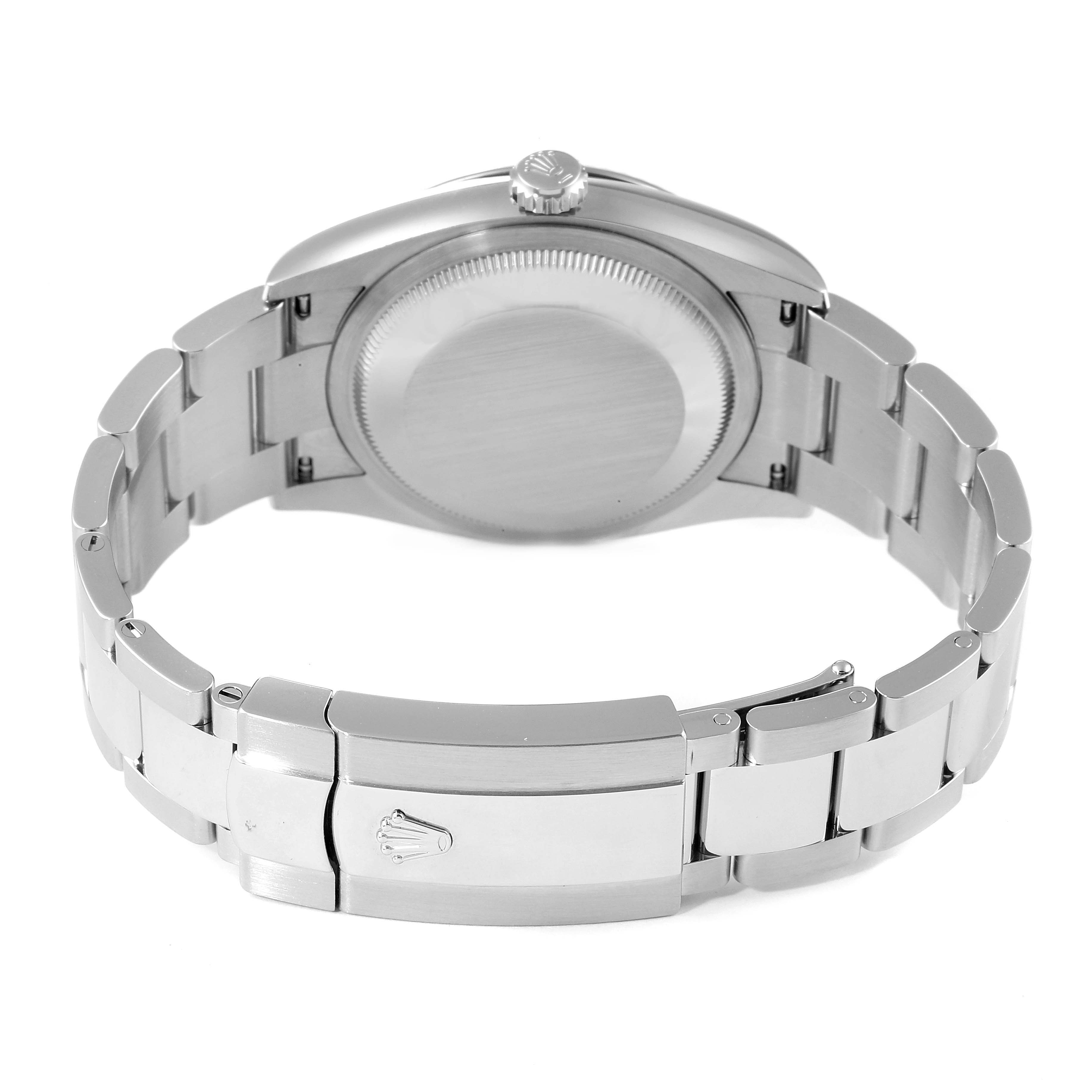 The image shows the back of a Rolex Datejust 126234 Men's Stainless Steel Blue Dial 126234 Men's Stainless Steel Blue Dial watch, highlighting the case back, crown, and the closed clasp on the bracelet.