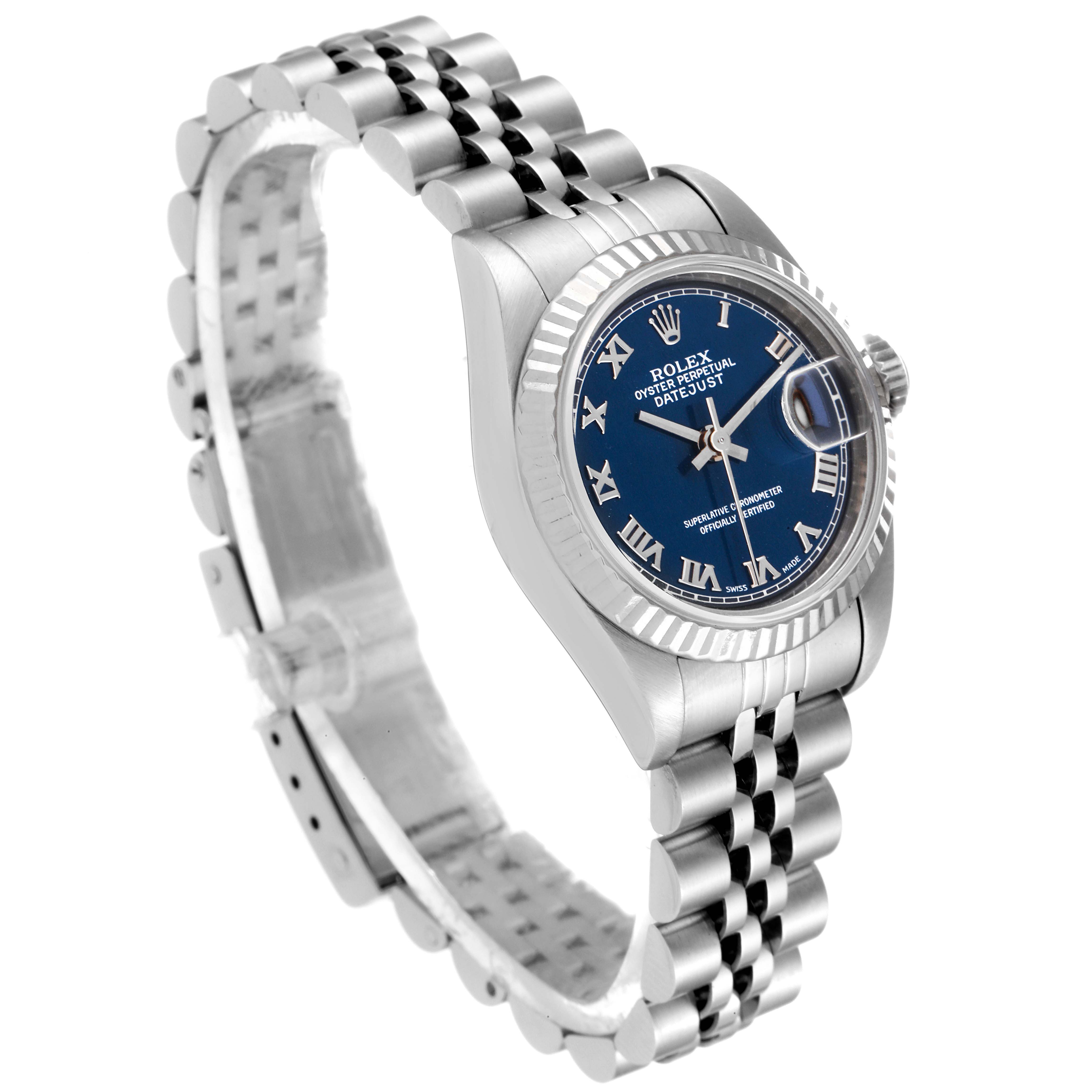 The image shows a Rolex Datejust 69174 Women
s Stainless Steel Blue Dial 69174 Women
s Stainless Steel Blue Dial watch at a side angle, displaying its face, bezel, and jubilee bracelet.