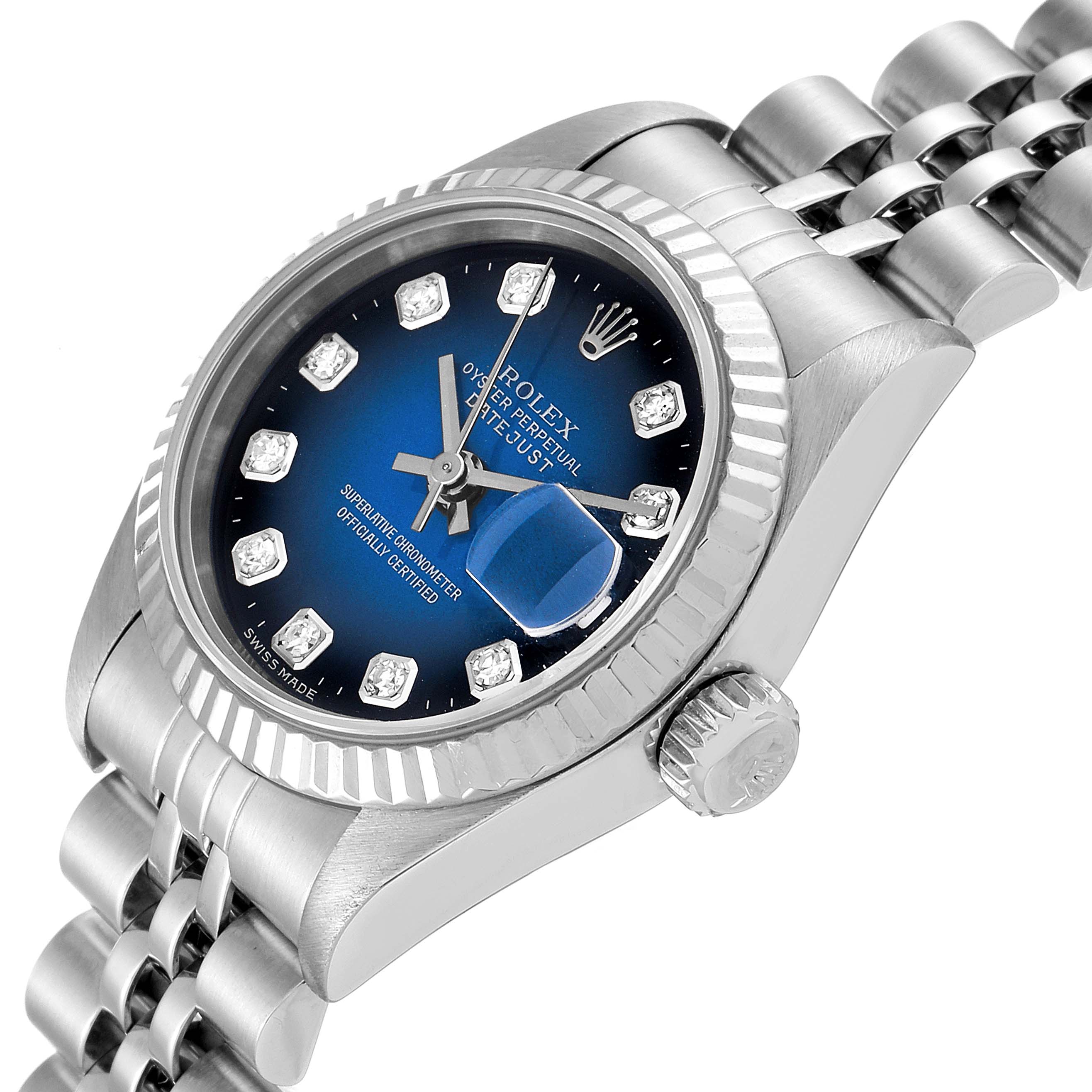 The image shows a close-up, angled view of the Rolex Datejust 69174 Women's Stainless Steel Blue Dial 69174 Women's Stainless Steel Blue Dial watch, featuring its bezel, crown, and partial bracelet.