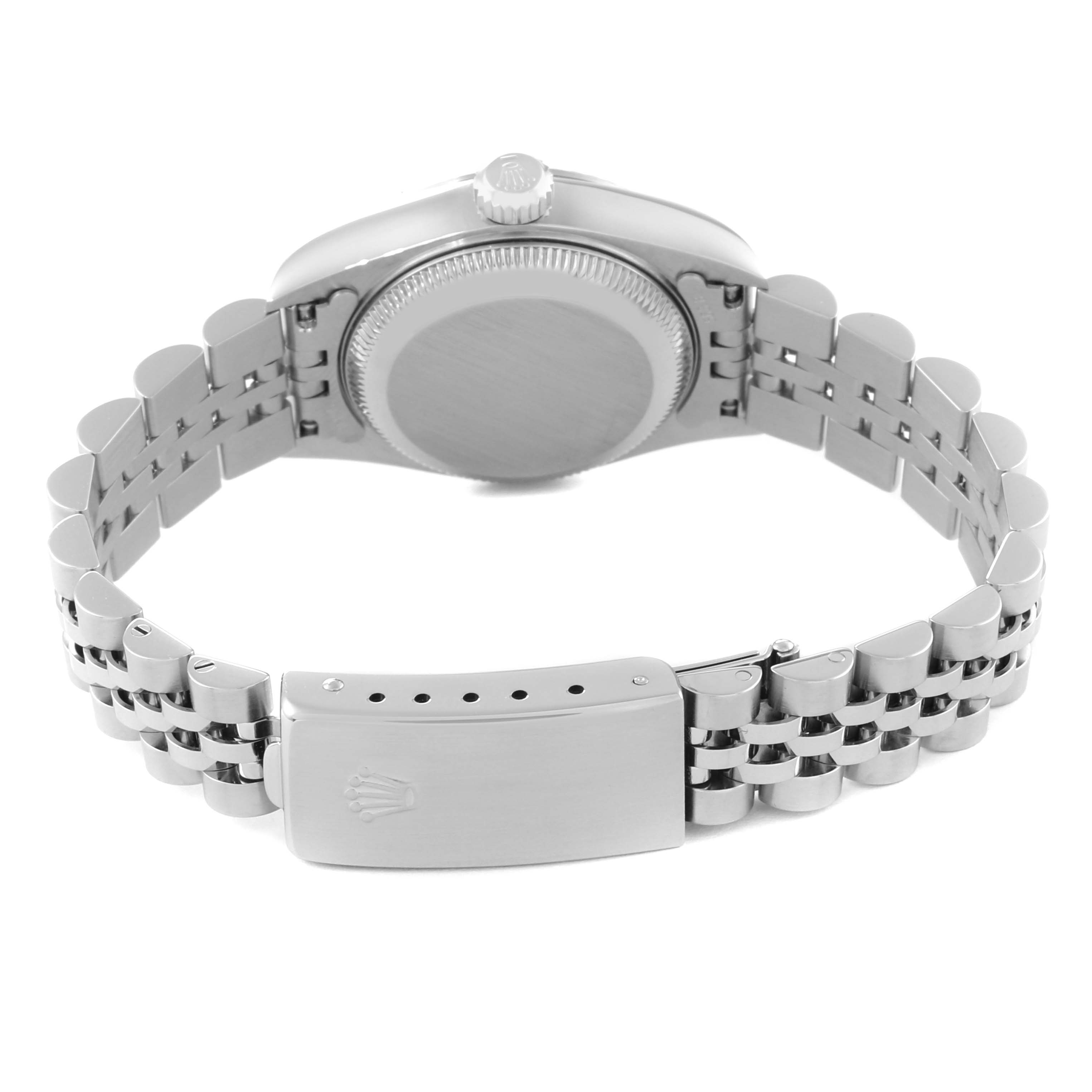 The image shows the back view of a Rolex Datejust 79174 Women's Stainless Steel Mother of Pearl Dial 79174 Women's Stainless Steel Mother of Pearl Dial watch, highlighting the bracelet, clasp, and case back.