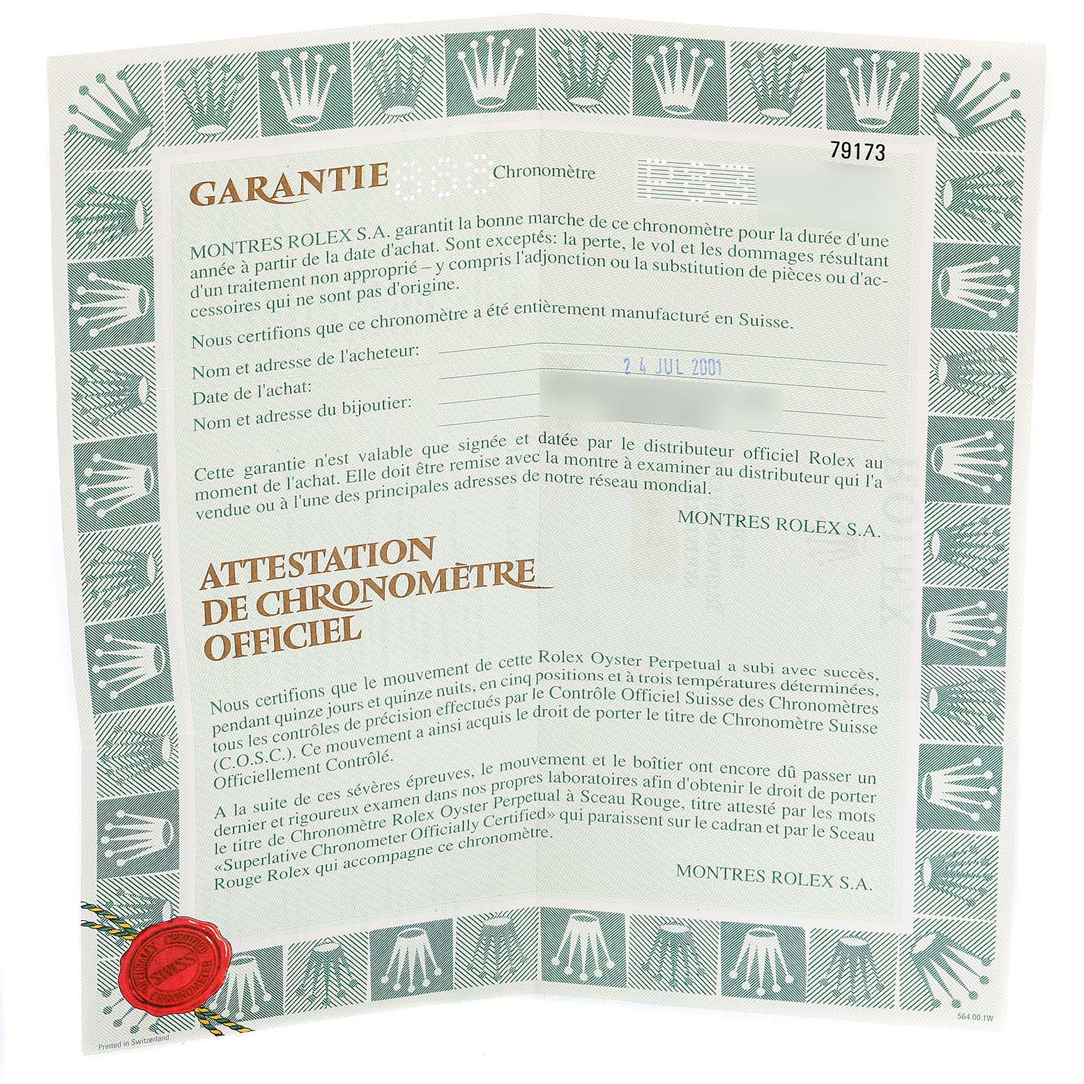 This is a certificate of guarantee for a Rolex Datejust 79173 Women
s Steel and Gold (two tone) Black Dial 79173 Women
s Steel and Gold (two tone) Black Dial watch, shown from a top-down angle.