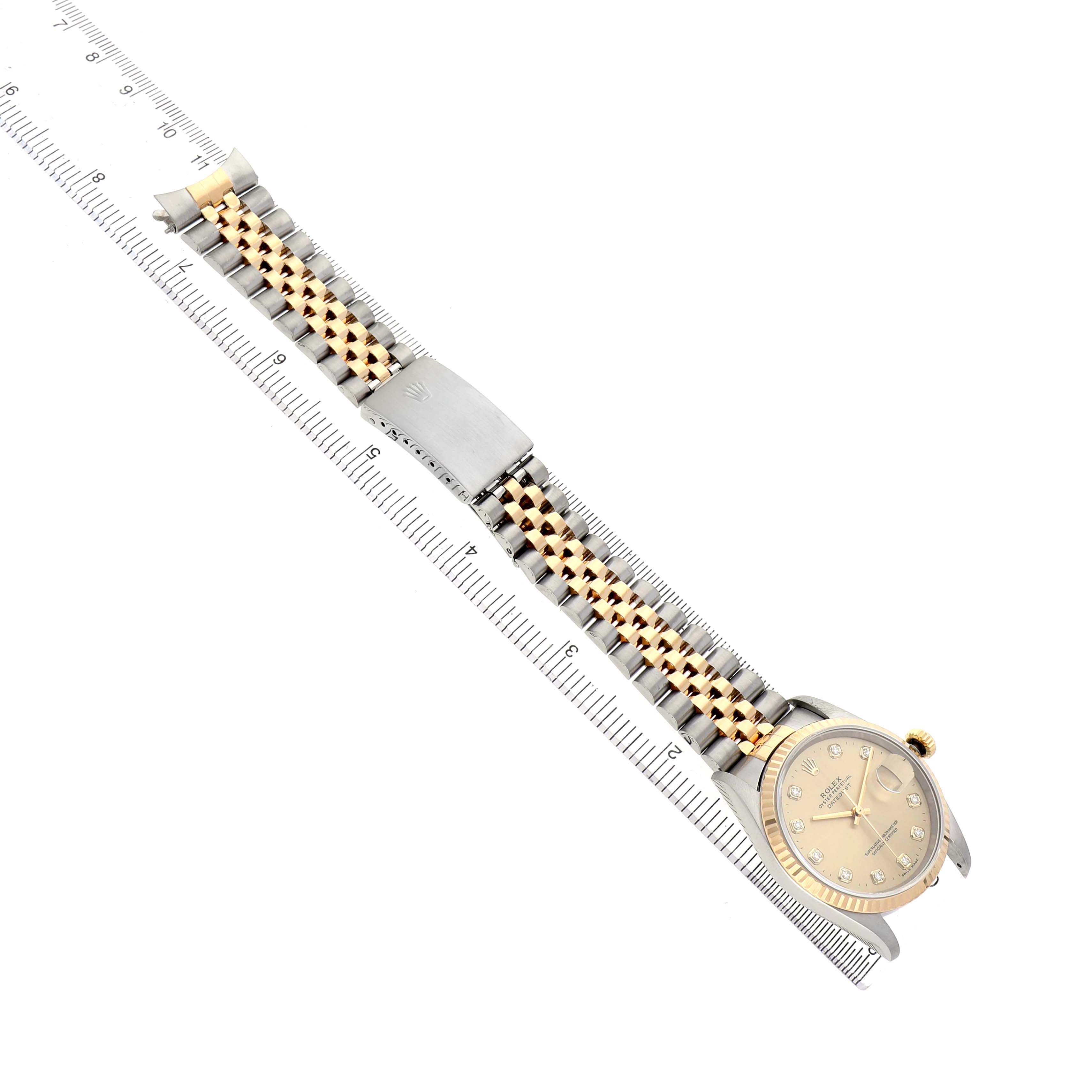 The Rolex Datejust 16233 Men's Stainless Steel Champagne Dial watch is shown diagonally, highlighting the dial, crown, and full bracelet with a folding clasp.