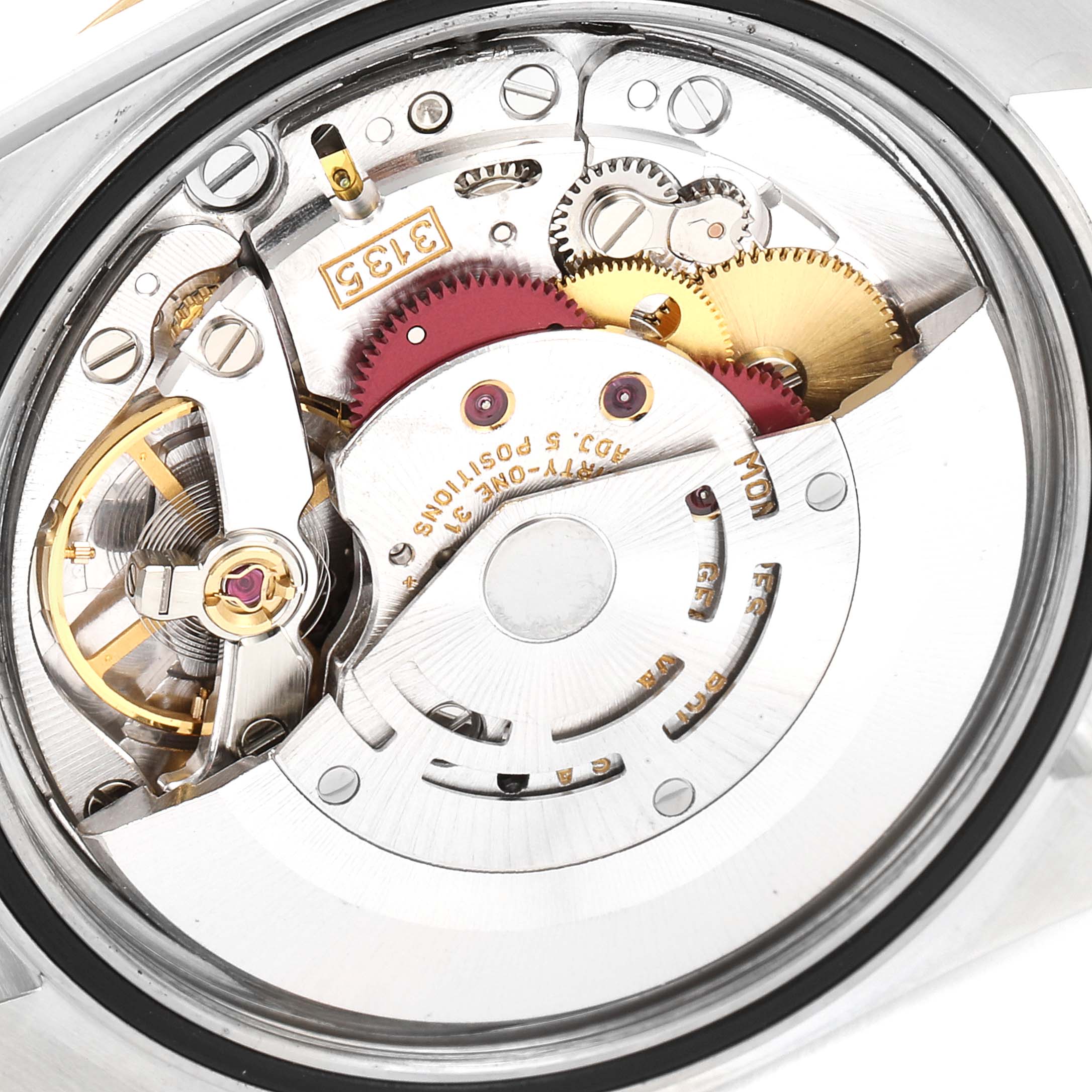 This is an internal view of the Rolex Datejust 16233 Men's Steel and Gold (two tone) Champagne Dial 16233 Men's Steel and Gold (two tone) Champagne Dial, showcasing its intricate movement and gears.