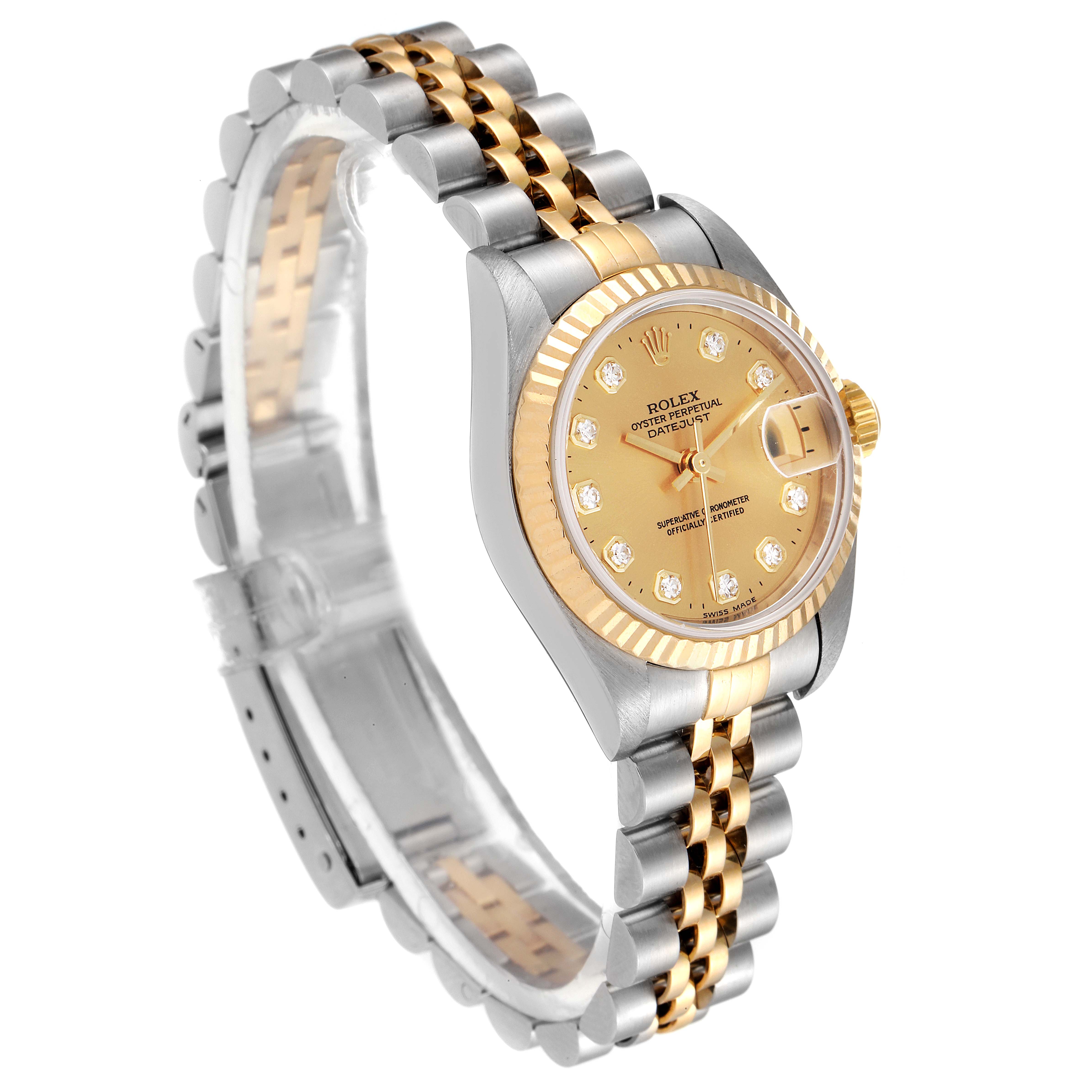The image shows a Rolex Datejust 79173 Women's Steel and Gold (two tone) Champagne Dial 79173 Women's Steel and Gold (two tone) Champagne Dial watch at an angle highlighting its face, bracelet, bezel, and crown.
